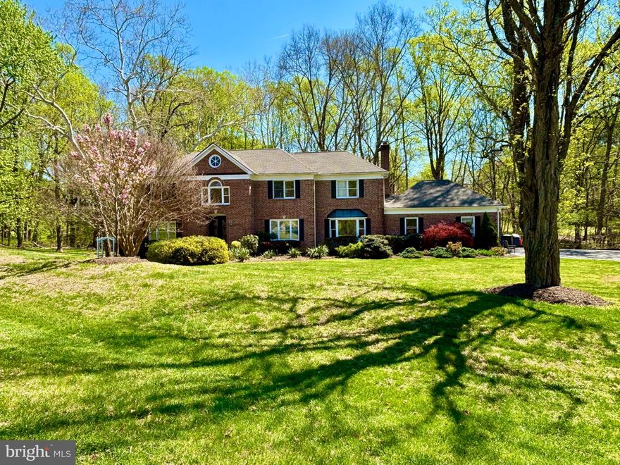 Nestled in the serene Rivers Edge subdivision, this stunning Colonial offers an exceptional blend of elegance, comfort, and natural beauty. A true sanctuary from the moment you arrive.
From the street, outstanding curb appeal sets the tone. Step inside and discover over 6,000 sq feet of beautifully finished living space featuring hardwood floors throughout, a smart floor plan with natural flow, and four fireplaces that create warmth and character in every season.
The updated classic kitchen is a chef's dream, boasting new cabinetry, upgraded countertops, a center island, and ample space for casual dining. Whether you're hosting a dinner party or enjoying a quiet morning, this home is designed for the way you really live.
The flexible floor plan offers remarkable versatility. Five bedrooms grace the upper level, while the main level features a room perfectly suited as an office or additional bedroom, conveniently located across from a full bath. The walk-out lower level — fully finished with multiple entrances, a wet/dry bar, and endless possibilities for recreation or relaxation — includes an additional bedroom and full bath, bringing the total to 6 bedrooms (main level bed/office could be the 7th!) and 6.5 bathrooms.
A three-car attached garage, a 5-years-new roof, double-pane windows, and thoughtful finishes throughout round out the interior appointments.
But perhaps the most memorable feature of this home is what lies just beyond your back door. Backing to a lush canopy of trees on an expansive 2.24-acre lot, this property feels like a world away — offering complete privacy, serene wooded views in the back, and a park-like setting that transforms your patios and deck into a peaceful retreat for morning coffee or evening gatherings.
And the location delivers even more.  Private neighborhood trails connect directly to the C&O Canal National Historical Park towpath — miles of scenic beauty for walking, cycling, and exploring, right at your doorstep.
This is not simply a place to live. It is a place where elegance meets nature, and where every detail has been thoughtfully considered. Welcome home.