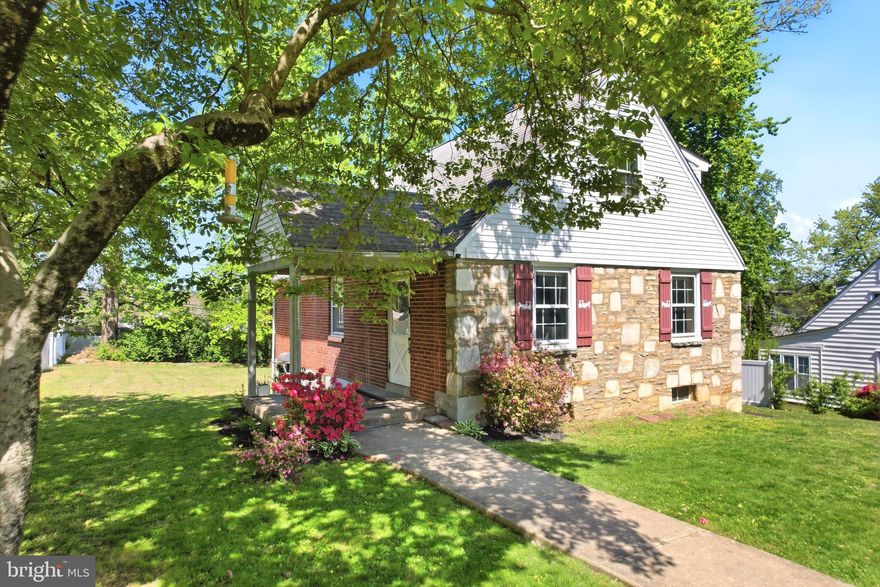 Welcome to this inviting home in Huntingdon Valley, where timeless construction meets a refreshed, modern feel. Set on a quiet residential stretch in the desirable Lower Moreland Township School District, this property offers a warm, grounded aesthetic with practical upgrades and a layout designed for real living. From the moment you arrive, the curb appeal stands out with a blend of classic stone and brick, mature trees, and a welcoming covered front porch that adds both charm and function.
Inside, natural light fills the main living area—offering a clean, neutral palette. The living room offers generous space for everyday comfort and entertaining, flowing easily into adjacent areas while still maintaining a sense of separation. Subtle architectural details, including an arched opening, add character without compromising the modern feel.
The first floor also offers a flexible bonus room that can function as a fourth bedroom, home office, playroom, or additional living space depending on your needs.
The kitchen is bright and efficient, featuring updated cabinetry, ample counter space, and stainless steel appliances. Large windows bring in natural light and provide pleasant backyard views, creating a space that feels both functional and inviting for daily use. The layout comfortably supports everything from quick meals to relaxed mornings at home.
Upstairs, the three bedrooms offer comfortable proportions and flexibility for a variety of needs, including guest space or a dedicated home office. The sloped ceilings add character while maintaining usability. Two full bathrooms provide convenience for both everyday routines and hosting guests.
The outdoor space is a true highlight. The backyard is expansive, open, and highly usable, offering plenty of room for recreation, gatherings, or future customization. A raised deck extends the living space outdoors, making it ideal for grilling or relaxing. Mature trees provide a sense of privacy while still allowing for open sky and natural sunlight.
Parking is another major advantage. The property includes a 1-car attached garage, 3 driveway spaces, and 3 additional off-street parking spots, providing flexibility that is difficult to find in this area.
Located in Huntingdon Valley, the home offers convenient access to local amenities, commuter routes, parks, shopping, and everyday essentials, all within an established residential setting.