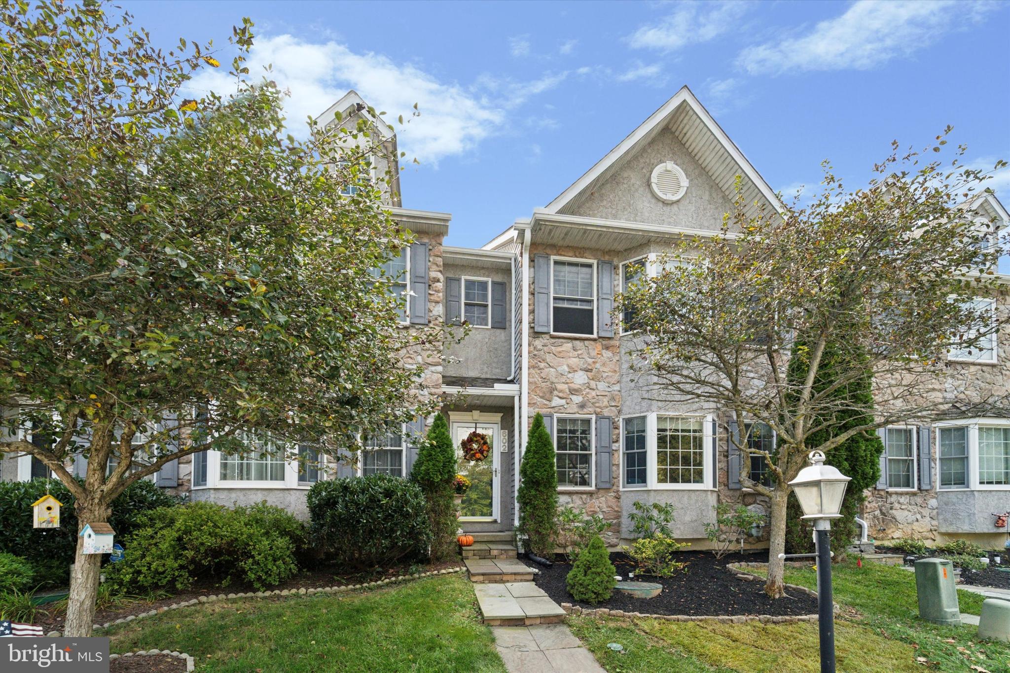 Welcome to 602 Bowers Drive, West Chester. A 3 bedroom, 2.5 bath townhome located in coveted Westtown Township. This inviting home has been beautifully updated and offers the perfect blend of warmth, comfort, and style. From the moment you enter, soaring ceilings and elegant moldings create a welcoming first impression, while expansive windows at the front and back fill the home with natural light and frame views of the outdoors.
Step inside to a bright sitting room with a versatile bar area — an ideal spot to greet guests or enjoy a quiet evening. From there, flow into the dining room, perfect for hosting dinners or holiday gatherings. The kitchen offers plenty of space for everyday cooking and entertaining, and it opens directly to the family room, where a gas fireplace, built-in bookshelves, and large windows set the tone for cozy, connected living. From here, step out onto the back deck and take in the tranquil views of mature trees, where deer often wander by. A retractable awning provides shade, making this the perfect place to relax or entertain outdoors.
Upstairs, you’ll find new luxury vinyl plank flooring throughout, along with the added bonus of a conveniently located laundry room right next to the bedrooms. The spacious primary suite is a true retreat, featuring a wall of windows, a large en-suite bath with soaking tub, separate shower, and dual vanities, plus a generous walk-in closet. Two additional bedrooms and a full hall bath complete the second level, offering light, bright, and neutrally toned spaces ready for your personal touch.
The lower level is designed for fun and relaxation, with a custom home theatre perfect for movie nights and gatherings. A two-car attached garage and driveway provide ample parking and convenience.
Beyond the home itself, 602 Bowers Drive is part of a warm and welcoming neighborhood where residents enjoy jogging and strolling with their loved ones or dogs — a true sense of community you’ll be proud to call home.
Reach out for the link to the Virtual Walkthrough with measurements.
