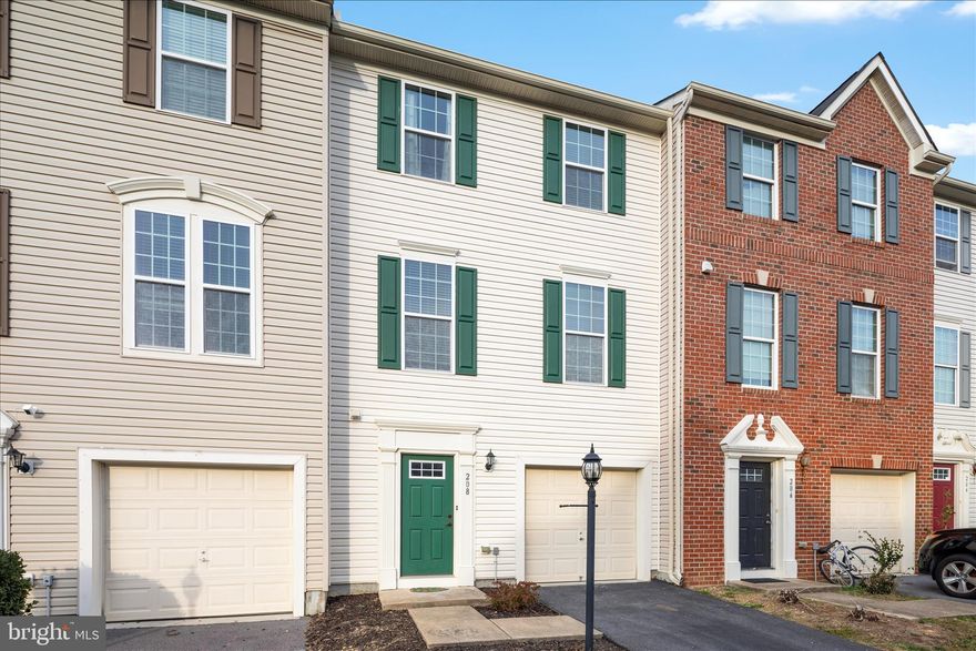 This beautiful three-level interior townhome offers style, comfort, and a great location in one of Stephenson’s most sought-after communities. The top level features three bedrooms, including a spacious primary suite with a tray ceiling, walk-in closet, and private en suite bathroom. The hallway and primary bedroom both feature newly installed luxury vinyl plank flooring for a modern, cohesive look. A convenient laundry area and a second full bathroom complete the upper level.

The main level is perfect for entertaining, featuring an open-concept design with a large kitchen that includes granite countertops, an island, and generous dining space. Step out onto the deck to enjoy a peaceful view of open space and trees—a rare find in this community where most homes back to other homes. The inviting living room showcases a full wall of built-in shelving with integrated lighting, adding both character and function.

The entry-level floor includes a welcoming foyer, half bath, access to the one-car garage, and a cozy family room that opens through sliding glass doors to the backyard.

Living in Snowden Bridge means enjoying resort-style amenities, including a community pool with a kid-friendly splash area, lap lanes, covered tennis and basketball courts, dog park, walking trails, and playgrounds. The neighborhood also offers easy access to Jordan Springs Elementary School and an on-site daycare/preschool for added convenience.

With its modern features, scenic views, and outstanding community amenities, 208 Fiesta Drive is ready to welcome you home.