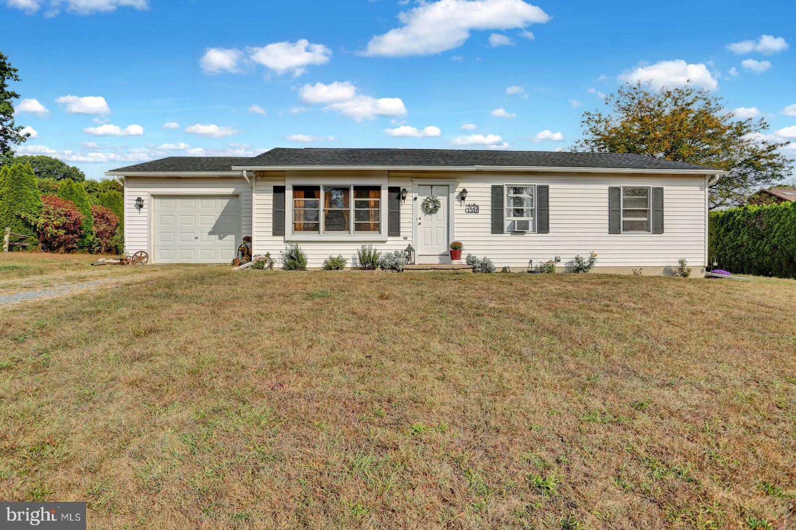 Looking for an affordable ranch home in Hamburg? 120 East Ct might be just what you’ve been waiting for! This 3 bedroom, 1.5 bathroom home offers an easy, one-level layout with plenty of space to relax and enjoy. Inside you’ll find a welcoming living area, an eat-in kitchen, and three nicely sized bedrooms. Outside, there’s a partially finished yard for kids, pets, or a garden, and a one car garage. A few other recent updates include new lighting fixtures, a new well bladder, a French drain installed in the basement, new hot water heater, and 3 new windows to be installed in October 2025. This home is tucked in a quiet cul-de-sac but still close to schools, shopping, parks, and major highways. Call to schedule your showing today!