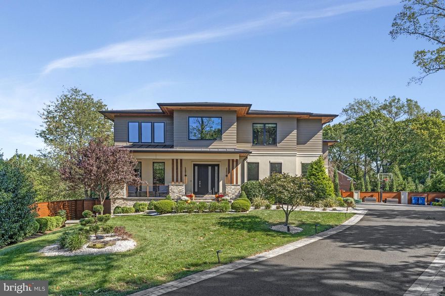 This spectacular custom-built home is intelligently-designed with 7 bedrooms, 7 full and 2 half baths and over 8,800 sq ft of living space on a professionally landscaped .47 acre home-site, with fully fenced back yard. The home features 10’ ceilings on the main level, 7.5” white oak engineered hardwoods, oversized windows, upgraded crown molding and trim, numerous custom built-ins and designer light fixtures. The main level features an open-concept living and dining area, divided by a dual-side gas fireplace, a home office/study, which can be used as a main level ensuite bedroom, and a gorgeous family room, with wall-to-wall windows. The impressive gourmet kitchen features an oversized center island with plenty of cabinet storage and space for 6 stools, as well as a large breakfast area. High-end appliances include Sub-Zero fridge and freezer, two built-in Sub-Zero wine refrigerators, a Wolf 6-burner range with a grill and two Jenn Air dishwashers. An oversized mud room, with custom built-ins, 2nd laundry area, and two powder rooms complete this level. The upper level features four well-proportioned bedrooms, each with its own ensuite bathroom. The luxurious primary suite features a large sitting area, a wet bar/beverage station and a huge walk-in closet with built-ins. The truly spa-like primary bath has a free-standing soaking tub, a walk-in marble shower, two separate vanities and plenty of custom storage. There's a bonus space, perfect for a second family room, study area or kids’ kick-out space, and at the end of the extra wide hallway, with custom closets, there is a balcony with a retractable screen and gas firepit. A large laundry room completes this level. The fully finished lower level with comfy cork-backed floors and high ceilings, features an expansive rec room, a large ensuite guestroom, a gym or additional bedroom with full bath, a media or storage room, and a wet bar with a dishwasher and ice maker and two full-size wine refrigerators. The home's exterior is equally impressive, with extensive hardscaping, landscaping and lighting, Hardi-Plank siding, an impressive 3-car garage, with wall storage system, epoxy flooring, ceiling storage racks, and built-in cabinets and a driveway has been expanded to allow for easy turn around as well as additional parking! There's a gas firepit on the deck for cozy nights, and a covered outdoor kitchen with a gas-connected grill for cooking outside. The deck has retractable screens and a solar-powered roof, so you can enjoy it no matter the weather. There's even a big side yard if you want to add a pool!
Other notable upgrades include radon remediation, two tankless water heaters, custom light fixtures, ceiling fans and remote-control shades in primary bedroom and common areas.  Minutes to downtown McLean and Tysons, with easy access to major commuter routes. Public Water and Sewer. McLean HS Pyramid.