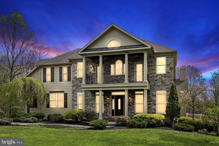 DON'T MISS OUT ON THIS PRICE IMPROVEMENT!!
Luxury Living in a Tranquil Country Setting—Minutes from Modern Conveniences

If you're looking for luxury living with a peaceful, country ambiance, yet want to be close to everything you need, this home offers the perfect blend. Thoughtfully upgraded and packed with high-end features, this exceptional property is anything but ordinary.

As you arrive, you're greeted by beautifully manicured landscaping and a charming front porch, setting the tone for the elegance that awaits inside. The grand foyer, complete with a chandelier and rich hardwood floors, opens to an impressive living space. Vaulted ceilings soar above the spacious living room, which features a stunning stone-front gas fireplace—ideal for cozy evenings.

At the heart of the home is the chef's kitchen, designed with elegance and functionality in mind. The gourmet space includes custom cabinetry, granite countertops, and high-end stainless steel appliances, including a brand-new dishwasher and wall ovens. A warming drawer and a luxurious butler’s pantry with a new refrigerator add even more convenience. From the kitchen, the open-concept family room features another fireplace and a TV, making it easy to stay connected with family while preparing meals. The main level also includes a well-appointed laundry room with a front-loading washer and dryer, sink, cabinets, and direct access to the garage.

The main level also offers a fantastic 5th bedroom with an adjacent full bath, ideal for an in-law suite or guest accommodations.

Upstairs, you'll find four generously sized bedrooms and bathrooms designed for both comfort and style. Two of the bedrooms feature walk-out access to a second-level deck, offering a peaceful retreat to enjoy the lush gardens and the evening before retreating to bed. . The luxurious owner's suite is a true sanctuary, complete with tray ceilings, a cozy sitting area with its own fireplace, and a spacious en-suite bath. The walk-in closets provide ample storage and complete the feeling of a private retreat.

Step outside onto the oversized back deck, equipped with built-in speakers that connect to the whole-home sound system. This is the perfect space for entertaining or simply unwinding under the retractable awning. The expansive, tree-lined backyard offers privacy and is fenced on the side, while an impressive shed provides additional storage space.

Additional features of the home include heated floors in the garage, which also boasts a pellet stove, built-in cabinetry, and shelving in the oversized two-car garage. The full walk-out basement is with heated floors, stubbed for a bath, and has large windows facing the backyard, flooding the space with natural light. With so much space and potential, this area can easily be transformed into additional living space to suit your needs.

For those who love fresh, local produce, you're just minutes away from a fantastic fruit farm that offers fresh baked goods, seasonal events, and delicious seasonal produce—truly a treat for the senses!

This home is a one-of-a-kind gem that seamlessly combines luxury with tranquility. Don't miss your chance to own this extraordinary property.