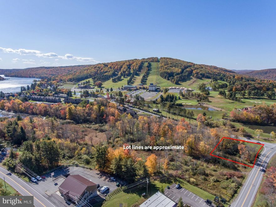 A rare piece of undeveloped prime residential or commercial building real estate at the corner of Marsh Hill and Sang Run Road. Be in the heart of Deep Creek Lake and only a few minute walk to Wisp Ski Resort.  Site has been recently approved to build a duplex or 2 single family homes.  Premier location for a private residence, a business, or a vacation rental investment that is unlike anything else in its proximity with the same visibility. The sky is limit with the potential on this site!