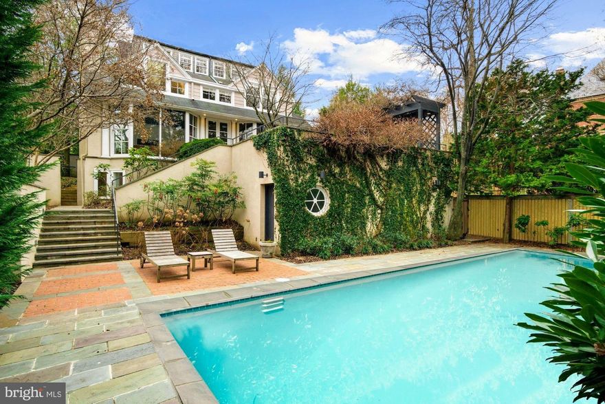 Elegant, understated mini-estate on a wonderful lot. This ideally located Wesley Heights home is full of character thanks to a complete designer renovation and expansion. Grand interior boasts 4-levels including substantial space for family and guests with 7 Bedrooms and 5.5 Bathrooms, 3 fireplaces, 2-car garage, and a brilliant entertaining floor plan with large scale rooms,  natural stone & stainless steel kitchen, and  family room addition offering floor-to-ceiling panoramic vistas to the incredible lush private gardens including extensive hardscaping with multi-level terraces, pergola, large swimming pool, fenced yard with tree house and more!  Perfect location just a stone's throw to neighborhood restaurants, and minutes to parks & trails, National Cathedral, Georgetown, The White House, and all of downtown DC. Must see to believe!