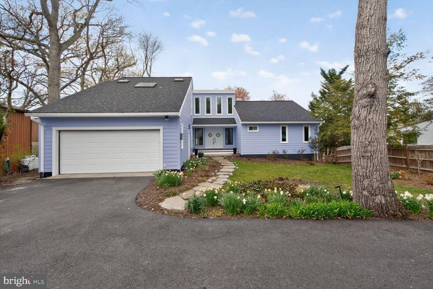 Welcome to an exceptional waterfront retreat offering truly breathtaking views. If you’ve been dreaming of a life on the water, this freshly painted 5‑bedroom, 3‑bath home, enhanced with brand‑new Hardie siding and high‑efficiency insulation (2025), is ready to welcome you. Step through the front door and immediately take in the stunning water views that define this home. The main level features a beautifully updated kitchen with premium stainless-steel appliances and elegant quartz countertops. Expansive new windows (2024) fill the dining room and spacious living room, complete with a cozy fireplace, and abundant natural light. New sliding glass doors (2024) open to a generous deck, perfect for morning coffee, family meals, or simply relaxing as the sunlight dances across the water. Three bedrooms and a full bathroom are also located on the main level, including a standout bedroom with its own sunroom, complete with skylights and a private slider to the deck. You may find yourselves debating who gets this special space. Upstairs, the primary suite offers comfort and privacy with a beautifully appointed en‑suite bathroom. The fully finished lower level adds even more versatility, featuring a large family room, a spacious bedroom, an office, a full bathroom, and a laundry room. Another large sliding glass door leads outside to a new hot tub (2024), a boat dock, a boatlift (2023), a waterfront retaining wall and boardwalk (2024) and new Kayak dock and rack. As an added bonus, the stand‑alone garage has been transformed into fully finished living space, complete with a movie‑theater‑style screen, ideal for entertainment or guest overflow. This is a rare opportunity to own a beautifully updated home with unmatched waterfront amenities. You won’t want to miss it.