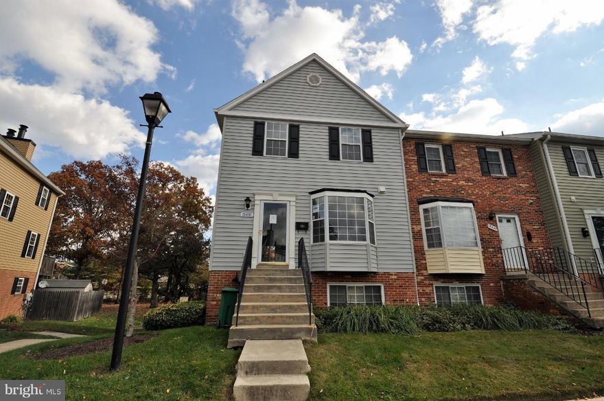 Corporate owned Prop. Sold AS-IS. Spacious 2 bedroom 1.5 bath Condo/Townhome in Laurel. Large Kitchen with a space for a table. Living/Dining room with cozy fireplace, and a sliding door to a deck! Fenced back yard. Bedroom level laundry. Conveniently located, close to major commuter routes, parks and the new Laurel Town Centre.