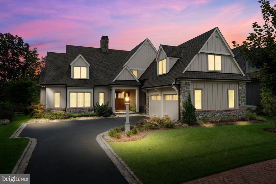 In the heart of Greenville’s exclusive Crooked Billet community, this elegant Dewson-built home combines timeless architecture with modern design and craftsmanship for truly elevated living.  Offering 4 spacious bedrooms and 3.5 bathrooms, this residence features an open-concept layout that’s as perfect for everyday comfort as it is for hosting guests. This elegant custom residence seamlessly blends classic architecture, modern comforts, and extraordinary craftsmanship.

Step inside and you’re immediately greeted by a grand foyer leading to the great room, where soaring beamed ceilings, custom millwork, and a gas fireplace create a warm yet sophisticated setting. Oversized Pella windows fill the space with natural light and frame serene views of the community’s preserved open space.

The gourmet kitchen is a chef’s delight, featuring premium cabinetry, stone countertops, high-end appliances, and an inviting dining area that flows effortlessly into the bright four-season sunroom. From here, step outside to a private slate patio complete with built-in grill, perfect for entertaining or quiet mornings surrounded by nature.

The first-floor primary suite offers a peaceful retreat, with two walk-in closets, a spa-inspired bath with dual vanities, and an adjoining study for work or relaxation. Elevator access connects all three levels, ensuring comfort and convenience now and for years to come.

Upstairs, three additional bedrooms each feature walk-in closets and access to beautifully appointed baths. A spacious finished room above the garage provides endless options for a guest suite, media room, or studio. The full basement, with high ceilings and roughed-in plumbing, offers the opportunity to create even more customized living space.

Additional highlights include an oversized two-car garage with storage, a mudroom and laundry space, and low-maintenance exteriors backed by a community-wide maintenance plan.

With unparalleled Dewson quality and a location just minutes from Greenville’s exceptional shopping, dining, and cultural attractions, 805 Brindley Way offers the perfect blend of elegance, convenience, and peace of mind.