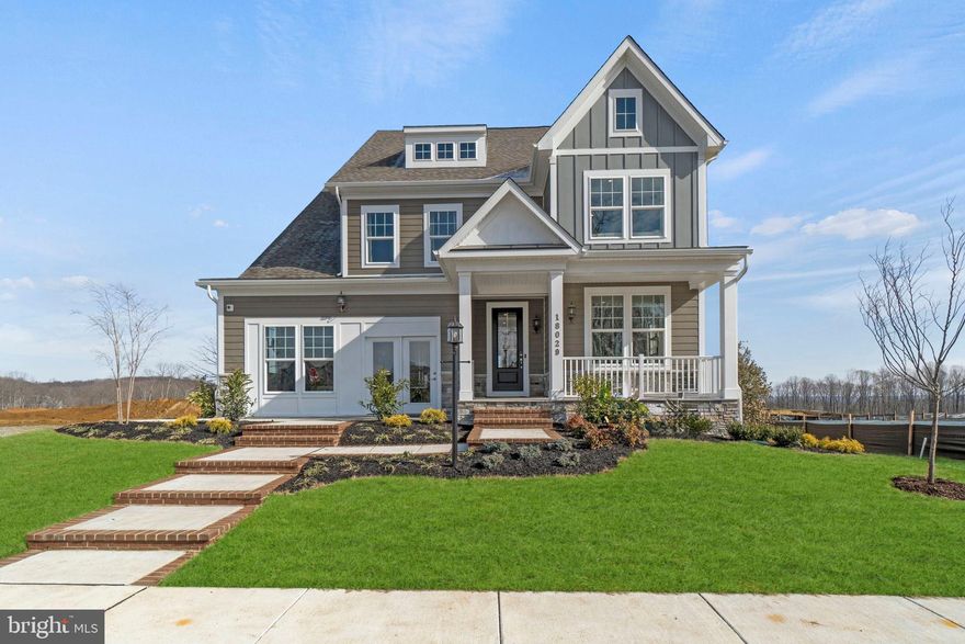 NEW STANLEY MARTIN HOME, move in before the holidays. The Caswell home design is all about opulence and flexibility. Homesite 82 is a 5 bedroom 4 full and one half bath townhome featuring an open-concept floor plan with Signature Professionally Designed and planned finishes. This beautiful home features an expansive island that seats up to six, and multiple generous walk-in closets. The flow from your large, yet cozy family room and dining area make this space feel complete and ideal for large gatherings. Relax and take in the sky view from your beautiful main level and light-filled walk-out basement. You will enjoy entertaining on your expansive main floor featuring an open concept and tall ceilings. At the end of the day, retreat to the primary suite with private sitting area and luxury en-suite bath with a stunning free standing tub and separate vanities. This room may become your favorite and will certainly inspire you to put your feet up and relax. Imagine watching the sunset in a community surrounded by the Potomac River. Potomac Shores is unparalleled when it comes to amenities. Experience the endless opportunities to bike, walk, run, swim, golf, workout, canoe, boat, or enjoy a seat in front of the firepit at the Golf Club restaurant open to all Potomac Shores residents. Enjoy the tree-lined community on over 85 miles of wide paved trails. Take the VRE train (projected 2025) to D.C. then back to the future town center on the water. Enjoy the convenience of two of the three brand-new schools that have been completed. *PHOTOS ARE OF A SIMILAR HOME.*