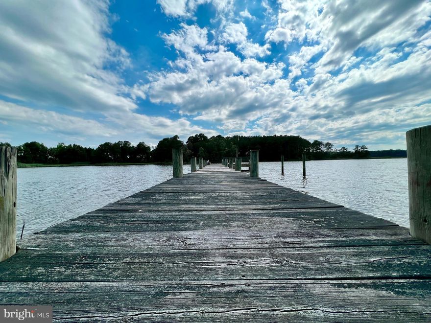 This prime lot is waiting for more memories. Perfectly situated as the last home with no thru traffic, waterfront with pier, cleared, and leveled. The raised rambler with a walkout basement will feel just like home with a splash of custom touches and some minor TLC. Home to great cookouts, holiday parties, and so much more; enjoy endless possibilities when it comes to entertaining, inside and out! Not just  a summer Home; being close to VA and Waldorf, makes it perfect for year-round living.  A fisher’s paradise as you cast a line and watch the sun set. Schedule an evening showing and see it in person! The final stop on your waterfront search.