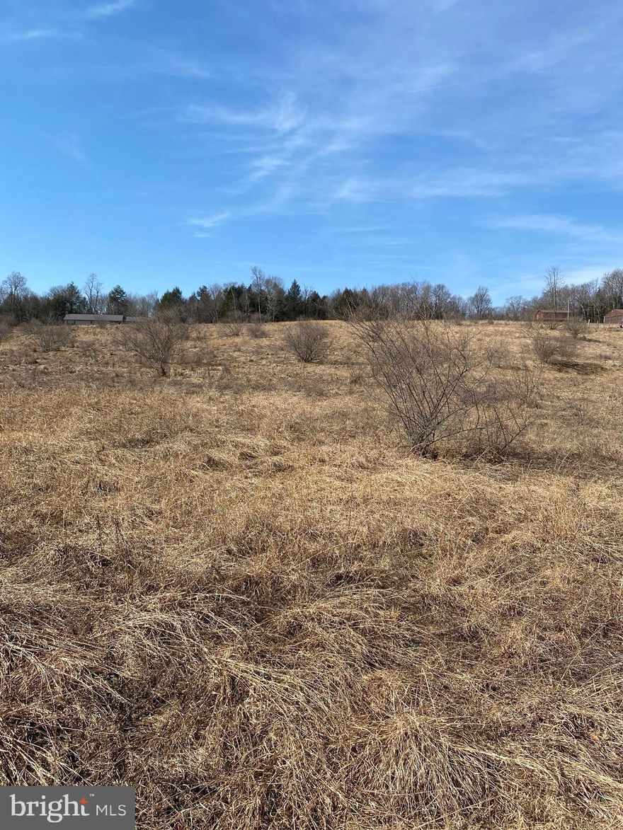 Spacious and stunning! This remarkable building lot boasts a prime location with a completed perc test and underground utilities, ensuring convenience and ease of construction. Enjoy panoramic views and the ambiance of the countryside, all just thirty minutes from Morgantown and a mere twenty minutes from the activities at Deep Creek Lake. Build your dream retreat here and embrace the best of both worlds - rural peace and quiet with convenience to town.