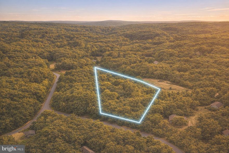 5 Acres of Pure Potential -Welcome to your future escape! This gorgeous 5-acre woodland parcel on Monalisa Lane sits in the scenic Eastern Panhandle of West Virginia — offering 252 feet of direct
road frontage, lush tree covers for natural privacy you may be looking for. The possibilities here are wide open. Build your dream estate home, cozy cabin retreat, hobby farm, or recreational getaway.
Utilities are accessible nearby thanks to surrounding residential development, and the
gently rolling terrain offers beautiful, flexible building sites.
Adventure and convenience are right at your doorstep — less than 30 minutes to shopping, dining,
and Berkeley Medical Center. Approximately one hour to Shenandoah National Park, and less than 2 hours to Baltimore, MD & Washington, D.C. The best of country living with city access whenever you
want. Give us a call or send a message today to book a showing!