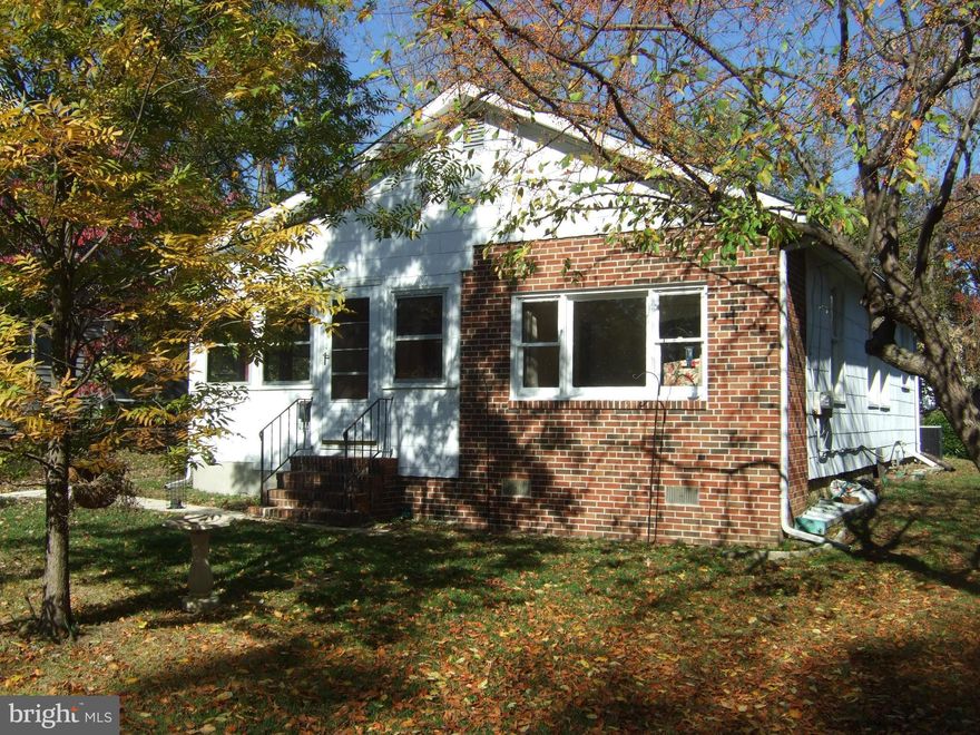 Prime location for this 2 bedroom 1 bath bungalow. Needs updating but has hardwood floors, newer furnace, CA and off street parking and garage. Estate Sale sold "as-is". Community waterfront park 1/2 block away. Additional lots available see MLS # AA9807365. ALL OFFERS PRESENTED MONDAY 11/14