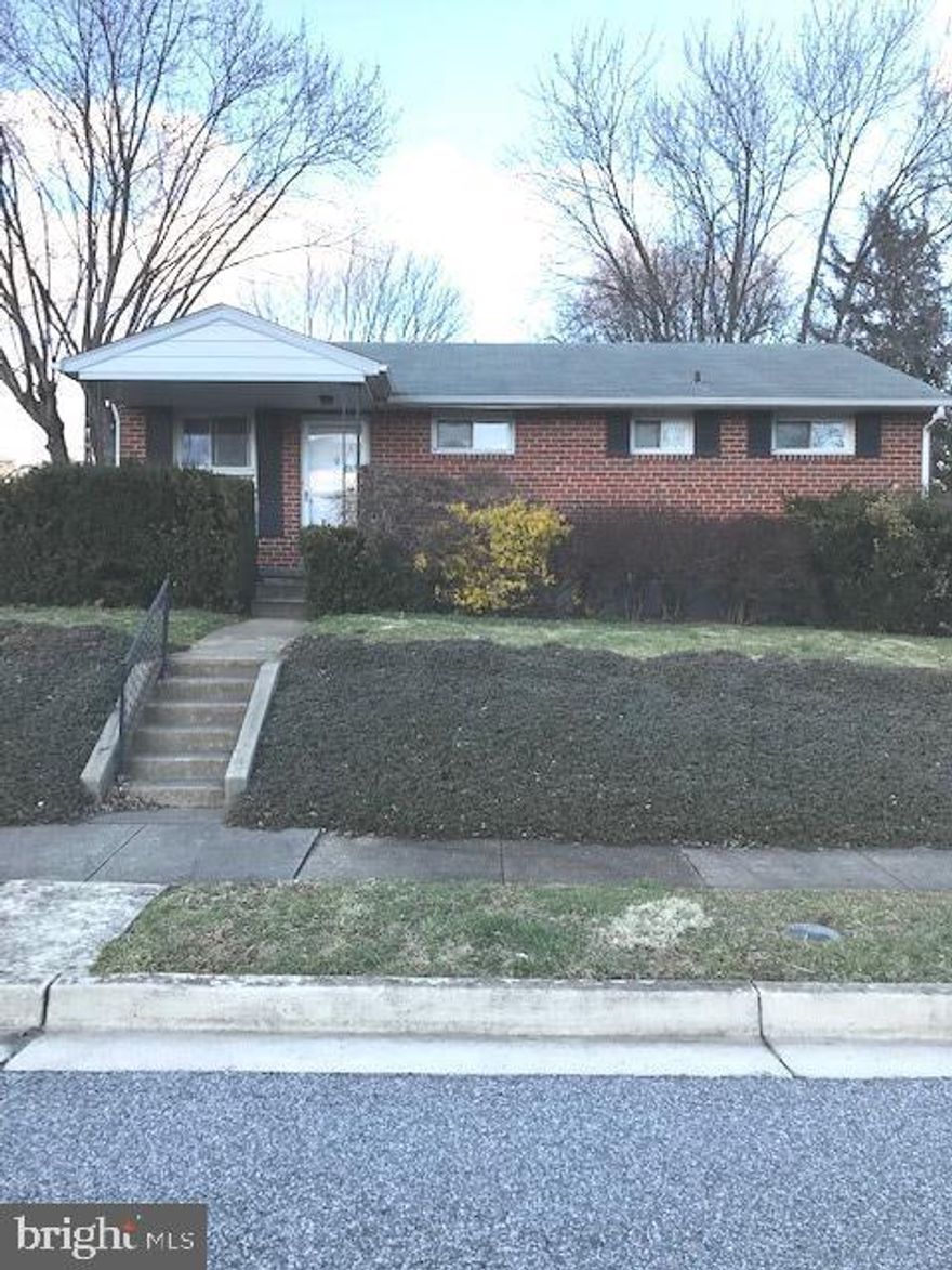 Well maintained brick rancher* Kitchen with white oak cabinetry, neutral counter and splash* White
appliances* New vinyl floor* Kitchen opens to huge covered back porch overlooking fenced yard*
Gleaming hardwood floors throughout* 3 bright bedrooms* Lower level family room with ornamental 'fireplace* Washer/dryer* & lots more!