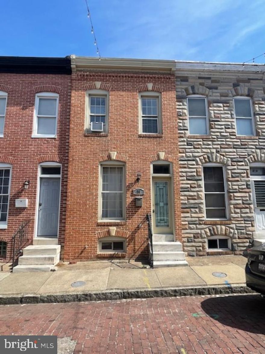 Buyers hurry fast and take a look at this spacious rowhome just a block north of Patterson Park! Open living/dining room, large kitchen with granite counter-tops, oak cabinets and tile floor. Half bath off kitchen. Main level features exposed brick walls, hardwood floors and iron railings on the stairways. Upper level has 2 large bedrooms, both with exposed brick walls, front bedroom has a tray ceiling with fan. Full bath in the hallway with a jetted tub. Finished basement for added living space and storage. Rear fenced yard. Central location near schools, shopping, easy access to downtown Baltimore and the harbor. Come see this one today!