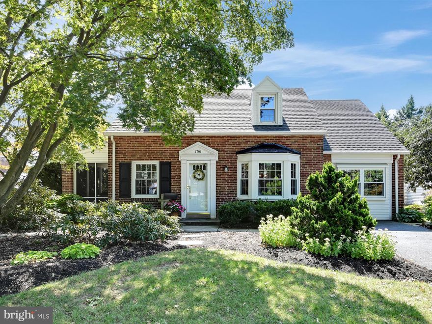 Cottage Charm-This charming brick two story home is located on a corner lot and offers various outside locations to enjoy the landscaped yard; screened side porch, back porch, flagstone and paved walkways. Entering the home, visitors are immediately greeted by a living room complete with hardwood flooring & staircase, and wood burning fireplace.  The dining room, in addition to hardwood flooring, offers a bay window with views of the landscaped front yard. The kitchen features stainless steel appliances, a gas stove and built-in pantry. The large recreation area features pocket doors leading from the kitchen and provides easy access to the combination laundry and mud room complete with tile floors. A full bathroom and back porch complete the main floor.  The wood staircase leads to the upper floor hallway with hardwood flooring. The upper floor includes a main bedroom with wood flooring, two additional bedrooms with wood flooring, along with a full bathroom that includes tile flooring and shower/tub. This home provides off-street parking , storage shed, and basement that includes an outside back entrance. This home is conveniently located close to local shopping and restaurants. Do not miss your opportunity to make this home your own!