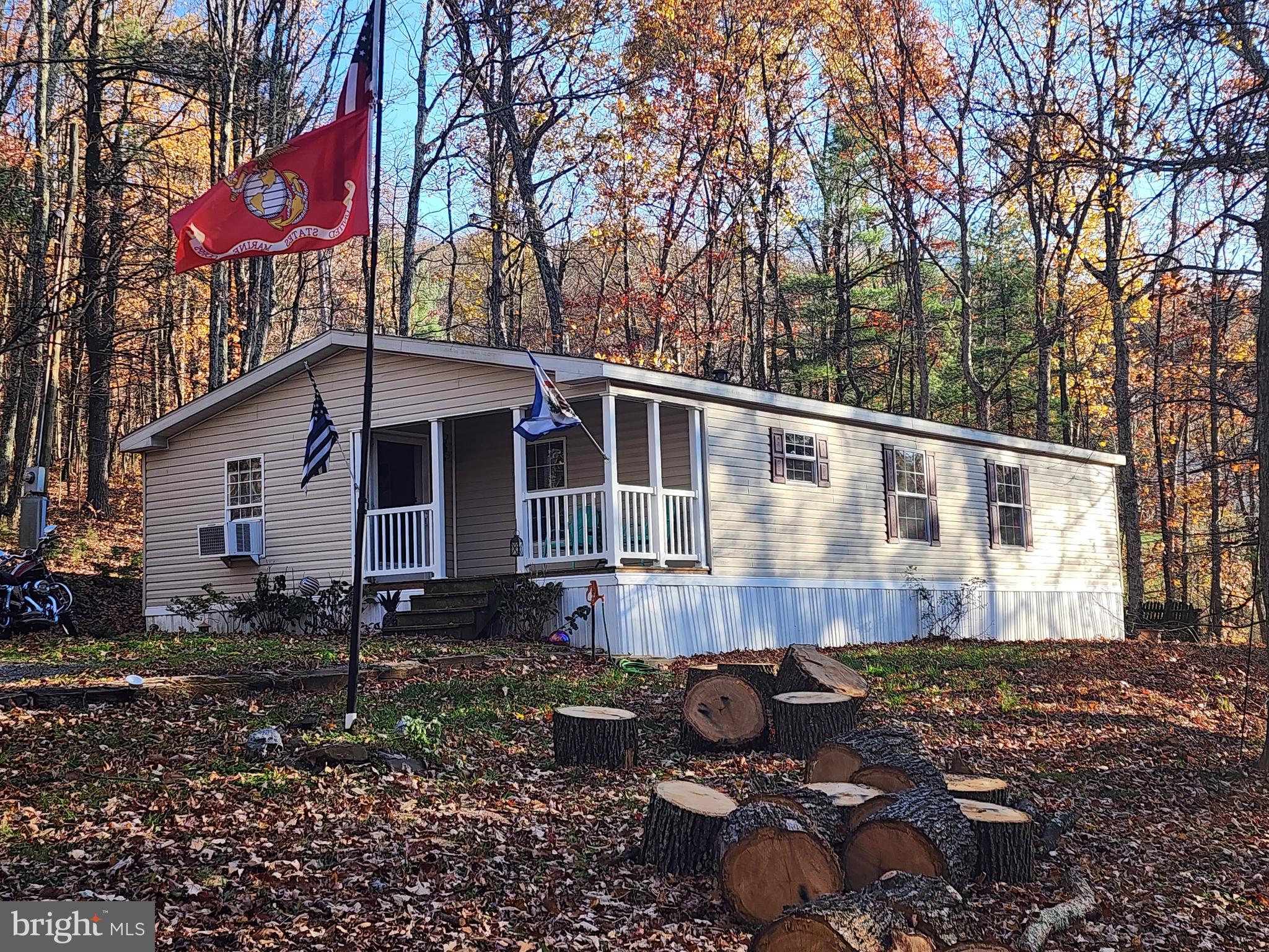 WELL MAINTAINED HOME ON A QUIET MOUNTAIN ROAD AWAITS NEW OWNER. LOCATED ON 2 ACRES OUTSIDE OF THE PEACEFUL MOUNTAIN TOWN OF PAW PAW, WV. THIS PROPERTY PROVIDES ALL OF THE NECESSARY INGREDIENTS FOR TRANQUIL, QUIET LIVING. NESTLED IN THE TREES ALONG A PAVED COUNTRY ROAD YOU WILL FIND THIS LOVINGLY CARED FOR HOME, WITH THE ORIGINAL OWNER STILL PRESENT. ORIGINALLY USED AS AN ESCAPE FROM THE CITY LIFE, IT HAS BECOME THE OWNER'S PERMANENT RESIDENCE IN RECENT YEARS. MAKE YOUR START IN THE SCENIC MOUNTAINS OF WEST VIRGINIA TODAY!