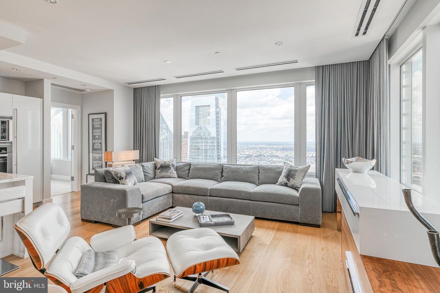 Enjoy breathtaking panoramic skyline views from this three bedroom, three and a half bath residence in the sky.   Perfectly situated in the center of it all, this residence is steps away from fine dining, one-of-a kind shopping, world-renowned cultural destinations, and exciting nightlife.
