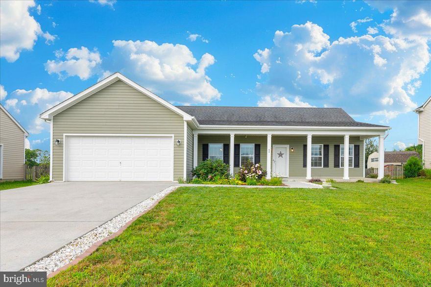 Gorgeous rancher in sought-after Crestfield Community! This beautifully maintained home offers amazing curb appeal with a full-length front porch that invites you to relax and enjoy the peaceful surroundings. Inside, you’ll find soaring vaulted ceilings and a bright, open floor plan featuring a spacious living room, dining area, and modern kitchen with quartz countertops, a center island, stainless steel appliances, and a huge walk-in pantry. The split-bedroom layout provides privacy and functionality, with two bedrooms and a full bath on one side and a luxurious primary suite on the other. The owner’s retreat includes a tray ceiling, walk-in closet, and spa-like bath with a double vanity, soaking tub, and separate shower. Luxury vinyl plank flooring flows throughout the main living spaces. You’ll also love the abundance of storage, the expansive oversized two-car garage, and the outdoor space—complete with a large patio and level backyard. Prime location with easy access to I-81—ideal for commuting to VA or MD!