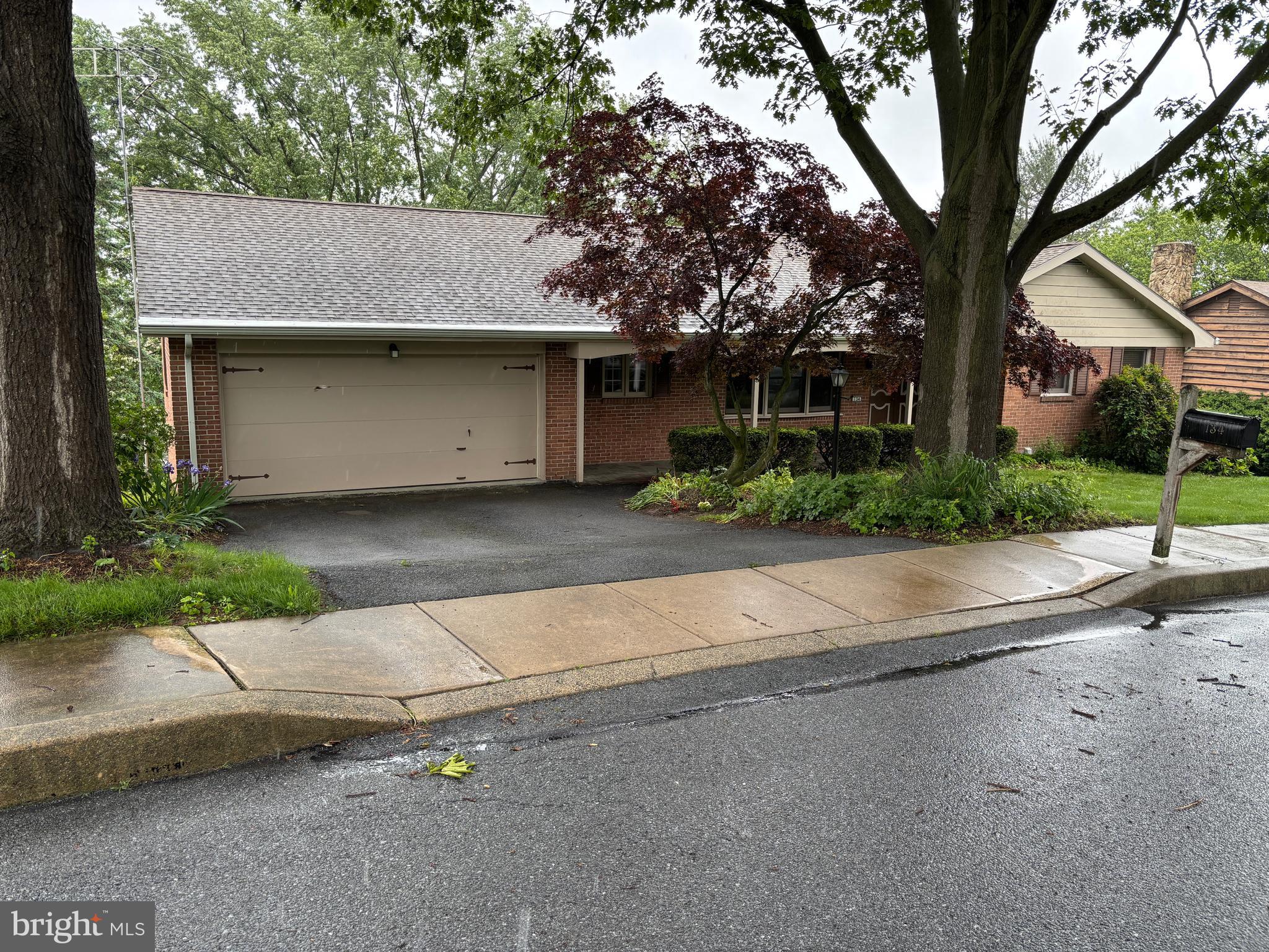 Offer in hand.... Presenting Tuesday, June 3rd @ 5 pm * Nicely maintained brick rancher in Akron Borough. - Nice, inviting entrance foyer w/Vermont slate floor. Spacious eat in kitchen, open to dining area or dining room. Huge living room w/vinyl laminate wood floors, brick fireplace w/pellet stove insert. - Bedroom 1 has beautiful Brazilian wood floors. Primary bathroom w/ceramic tile bath & shower. - Built in cabinets Bedroom 2. - Bedroom 3 behind garage, perfect for in law/young adult (original laundry). - Full daylight basement w/finished family room, powder room. - Workshop/laundry 13x17. Large 13x17 Bedroom 4/exercise room, easily finished for your need. - Lower level heated and cooled w/mini split. - Electric heat pump w/central air main level plus original ceiling cable and baseboard heat. - Ample storage and closet space-Pleasant front porch covered w/Vermont slate. Listen to the birds on the large 8x23 rear deck-Many native plants and wildflowers Close to the Ephrata/ Lititz Rail trail- Super location, minutes to Rt. 222 and PA turnpike.