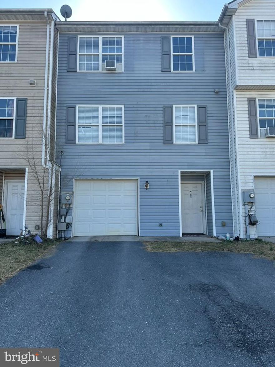 Priced below market value and perfect for an investor ready to add some TLC or a homeowner ready to make it their own.  The home is in overall good condition but could use some updates such as new floors, paint, and some minor repairs. The unfinished room in the basement could be the perfect spot to add another bedroom or a rec room. The main level features an open concept with a spacious living room and kitchen with dining area. Close to local shops and restaurants in Inwood, this townhome offers easy access to I-81, route 11, Charles Town, and Winchester. **SOLD AS IS.