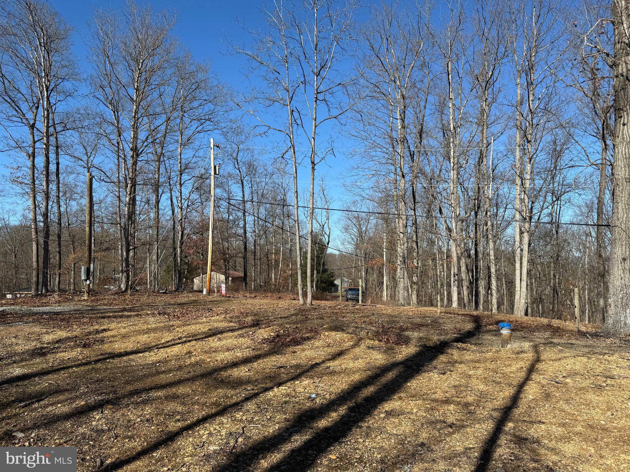 Seasonal Camping Site, Cabin or Permanent Residence! - This property offers everything you need to bring your camper for the weekend! Utilities include a well, septic (3 BR) and electric. Located halfway between Berkeley Springs and Martinsburg. This may be your spot for your full time residence of mountain get-a-way!