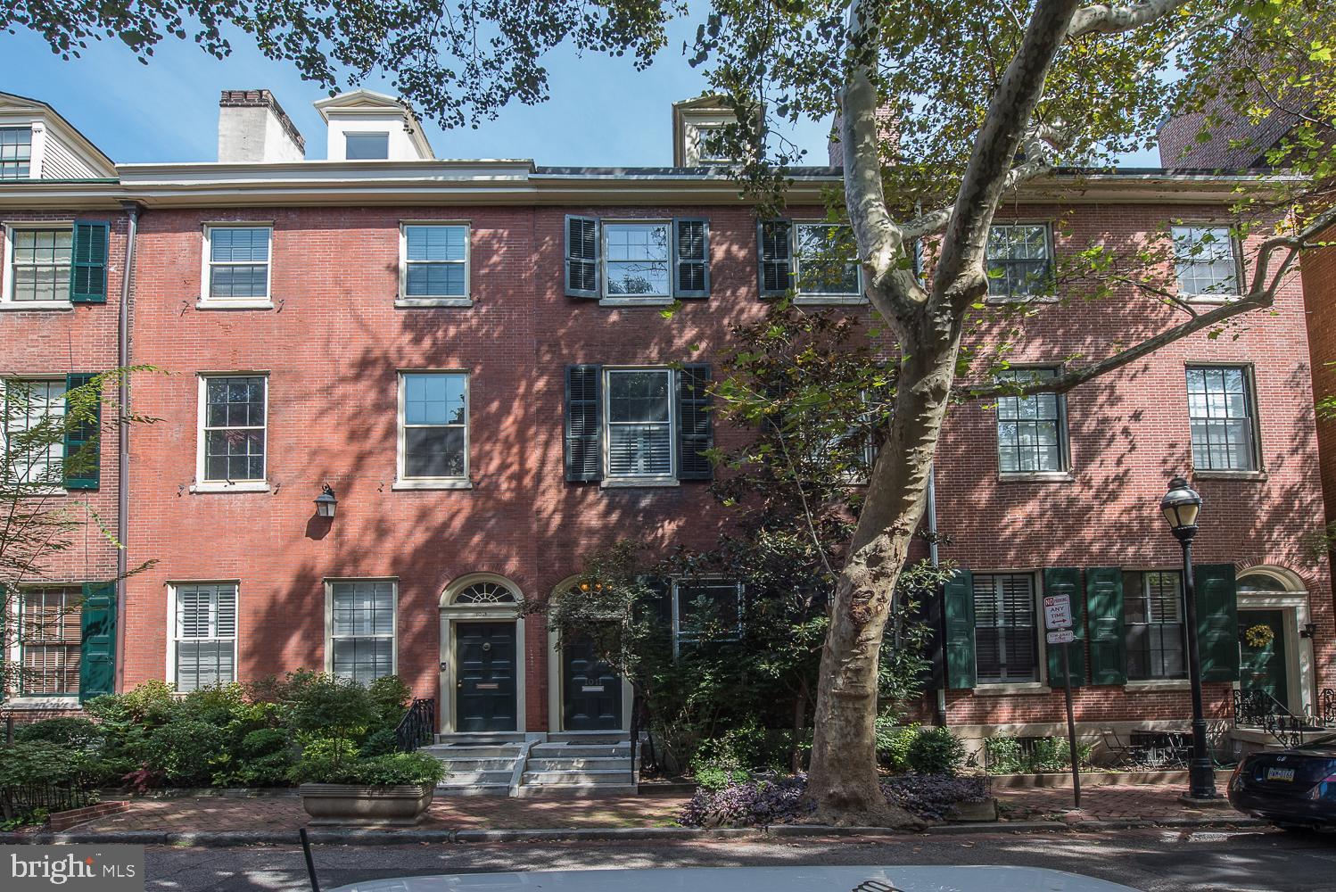 A perfect combination of old-world meets modern day in this sophisticated bi-level 1 bedroom/1.5 bathroom condominium home located in a charming brownstone on one of the most sought-after blocks in Washington Square West! This fabulous home, located on just the Second Floor of the building, is filled with the original architectural details. The light-filled & inviting living room features a gas fireplace with decorative mantel, chair rail moldings, built-in shelving and corner windows. The renovated kitchen, which features beautiful cabinetry, granite counter tops, tumbled tile back splash, stainless steel appliances and granite breakfast bar, opens to the sunny dining area. The first floor also offers a large storage closet and a lovely powder room! The second floor showcases a large, dramatic loft bedroom with cathedral ceilings, exposed brick & ductwork, a fantastic walk-in closet and a luxurious bathroom featuring an oversized shower with decorative tile, vanity with granite top, a bidet and washer/dryer. Additional features of this wonderful home include the original pine floors on the first floor, oak floors on the second floor, Hunter Douglas blinds, a large storage room in the basement and low condo fees! Located within a very short walk to the many restaurants of Wash West, Whole Foods, CVS & public transportation. The seller will pay for one year parking at the garage located at the end of the block!