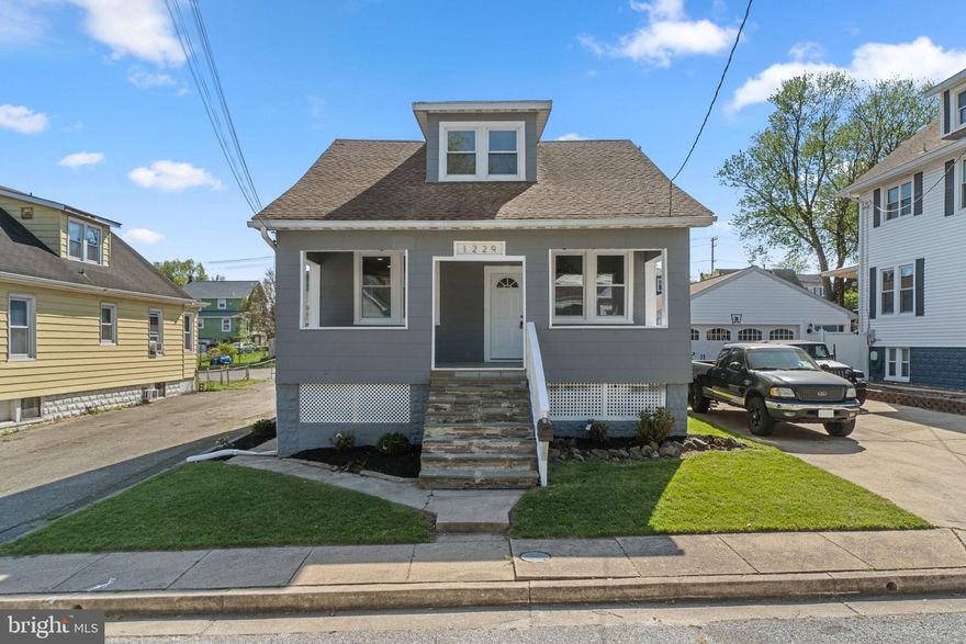 Welcome to 1229 North Ave — a beautifully renovated home where the heavy lifting has already been done. From top to bottom, this property has been thoughtfully updated with stylish finishes, modern touches, and a fresh, turnkey feel throughout.

The main level offers an open, bright layout anchored by a stunning renovated kitchen featuring ample cabinetry, granite countertops, a stylish backsplash, and brand new appliances. It’s a space that feels both functional and inviting, flowing nicely into the main living area with a fireplace that adds warmth and character.

One of the standout features here is the flexibility of three fully renovated full bathrooms — one on each level — a rare and incredibly practical setup. New flooring runs throughout the home, including luxury vinyl plank on the main level and fresh carpet on the upper and lower levels.

Upstairs, the bedrooms are comfortable and efficient, while the finished basement provides valuable bonus living space perfect for a family room, guest area, home office, gym, or playroom. Beyond the cosmetic updates, the major systems are brand new as well, offering added peace of mind for the next owner.

Outside, enjoy the large covered front porch, a rear patio ideal for relaxing or entertaining, and a fully fenced backyard with room to play, garden, or let pets roam.

The location is a major bonus as well, offering convenient access to I-95, I-695, the MARC train, UMBC, BWI Airport, and countless shopping, dining, and commuting options.

If you’ve been searching for a move-in ready home with style, updates, and versatile space at an attractive price point, 1229 North Ave is one you won’t want to miss.