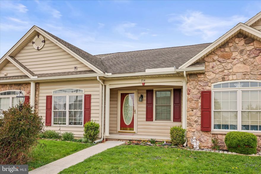 EASY LIVING can be found in this beautiful turn key home.  This home has 2 bedrooms and 2 baths complete with gorgeous gleaming laminate flooring.  The owners suite boasts tray ceilings and double sinks in the private bath.  You'll love the  convenience of the 1st floor laundry and the fact that all appliances are included.  This home has neutral decor and shows very well.  There is a basement which is ideal for storage with tons of shelving.  You have private parking in the back or the garage which is finished.  natural gas heat which is warm and the most efficient and public water and sewer.   Low maintenance and easy access to stores, churches and all in-town conveniences.