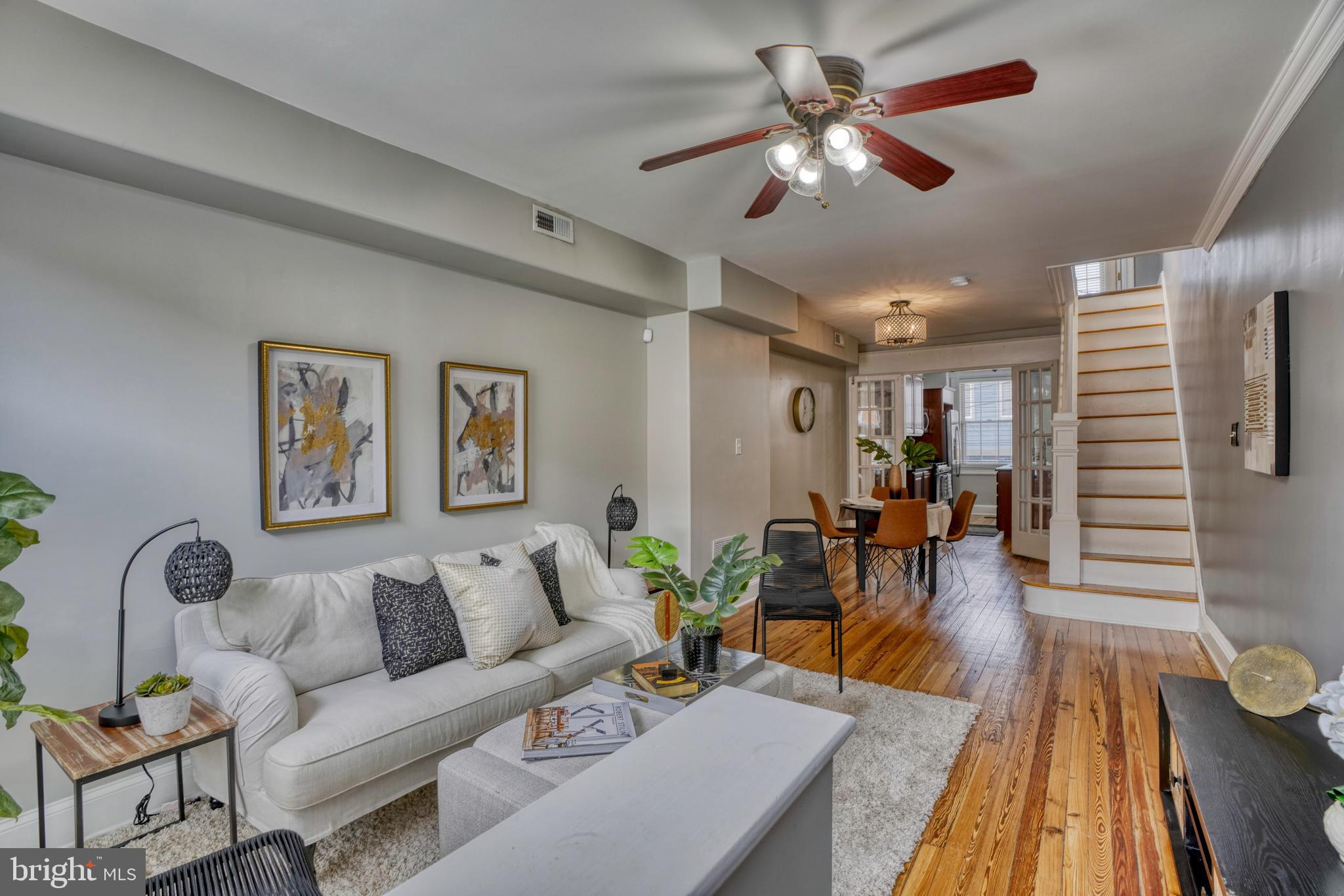 REDUCED!! Pride of ownership abounds in this charming 2 bedroom row home! Prime location between Patterson Park and Canton square! Features include original hardwood floors, updated kitchen with granite, stainless, and large island. Enjoy a beautifully updated bathroom with dual vanities and spa like double shower. The lower level would make a great family room or potential third bedroom space with rear door exterior access. Enjoy city living and come home anytime to your dedicated off street PARKING PAD!