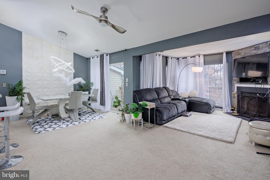 Welcome to Oakleaf Villas Community! This condo features 2 bedrooms and 2 baths.  Experience an open and airy feel with vaulted ceilings throughout the home. Step out onto a newly constructed deck and enjoy serene views of lush woods.  The condo includes a galley kitchen with new Quartz counters, a bar area for casual dining, as well as a separate dining area for more formal gatherings.  Recently updated HVAC. In-home washer and dryer. Ample parking is available for guests. Conveniently located near local shopping centers and major commuter routes to Baltimore, Annapolis, Fort Meade, DC, and BWI Airport.