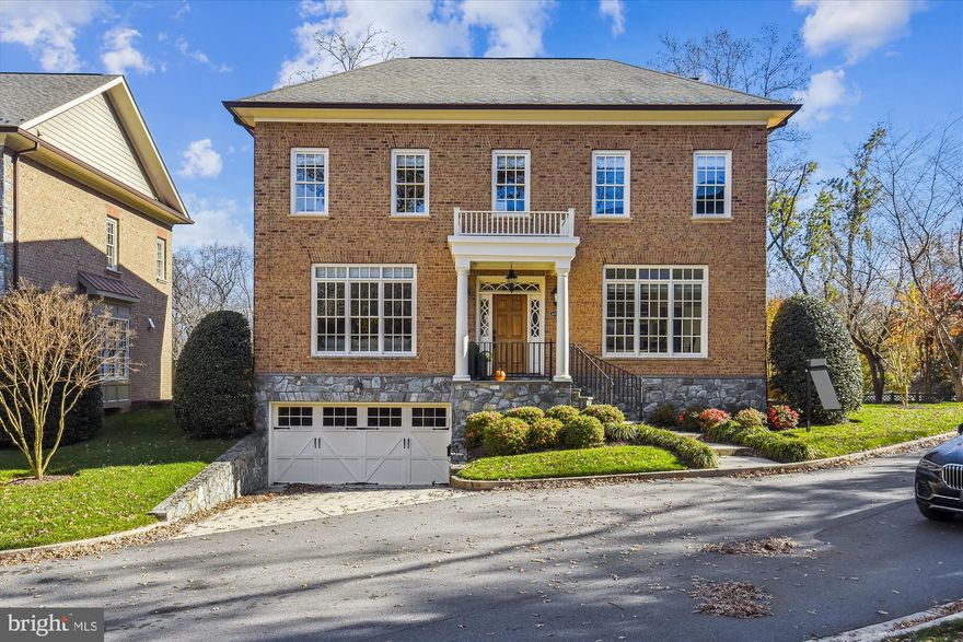 Regal on Richmond! Elegance and exceptional quality are found in this all-brick home with  5 bedrooms, 4.5 baths and a 2-car garage. Leafy enclave of five homes on a private cul-de-sac minutes to Chain Bridge and a stone's throw from Washington, DC.
This classic beauty was the former model home and boasts a NAHB GREEN Certification. Inside you will find 10 foot ceilings on the main and upper levels with the layout and architectural finishes of timeless design.  The center hall foyer is flanked by the living room to the left and a private office with glass french door entry and a  wall of built-in shelving to the right. Perfect for working from home during every season. Gorgeous random-width, re-purposed hardwood floors grace the upper and main levels. They are simply beautiful and a rare find! Well-fitted gourmet chef's kitchen with stainless steel appliances, 6-burner Wolf gas range, granite countertops and center island for all the extras, food prep, homework or eating a quick snack. Light-flooded breakfast nook transitions nicely to the cozy family room with a gas fireplace and nearby powder room. 
Entertaining from large holiday gatherings to special intimate dinners in a formal dining room, is always au-currant- 4001 Richmond is happy to oblige with butler's pantry/wet bar with wine storage as well.

 The upper level boasts a spacious primary suite with two walk-in closets, spa bath with dual marble-topped vanities, a marble-tiled walk-in shower, a corner Jacuzzi tub, and separate water closet. Three additional bedrooms, two full baths and full laundry room with a convenient sink & storage cabinets complete the upper level. 

Walk out to serenity on your slate patio and well-manicured yard from the spacious lower level, incorporating inviting recreation room, gas fireplace, wet-bar, 5th bedroom with en-suite full bath, game/fitness room and storage area. 

A few important features:  This home is "roughed-in" for an elevator, has an energy-star heating and cooling system so has achieved the "Green Home" rating...utility costs are extremely low. Windows are Low-E  which is the most  efficient and highest performing window so there is  no fading of the beautiful wood flooring/furnishings.
The  HOA maintains most lawn and landscaping work; snow removal costs extra and is shared among the homeowners. 
One light to DC/Chain Bridge, easy access to GW Parkway and I-495. Walkable to local hiking trails leading to the Potomac River.  Superior Quality throughout!