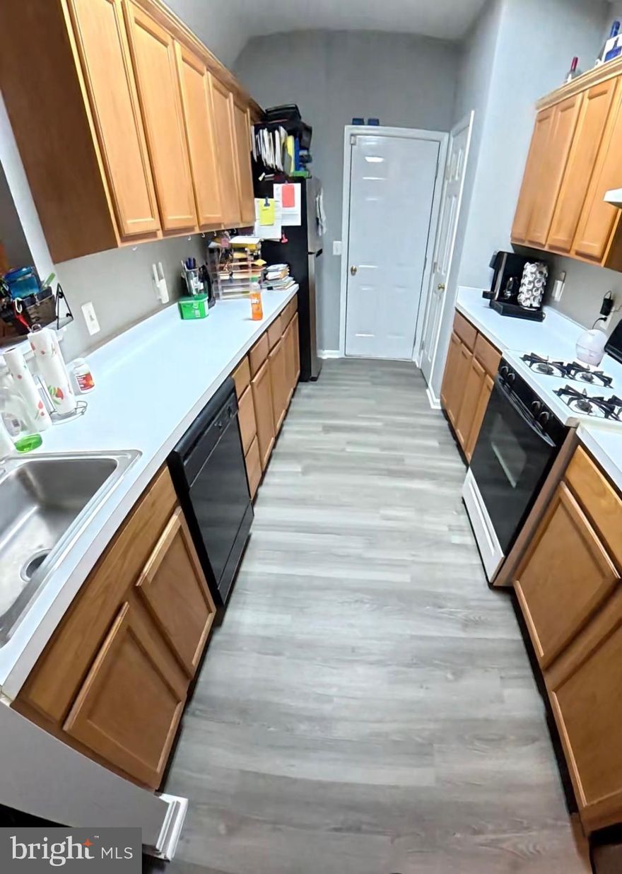 PRICE REDUCED,  2-bedroom, 2-bath condo, where comfort meets convenience! Bathed in natural light, this beautifully designed two-level home invites you to experience a blend of elegance and warmth.  Brand New LVP flooring, fresh paint, enter through the welcoming foyer on the ground level — choose from the attached garage or the charming front door, ensuring your ease and privacy. The heart of the home lies on the second level, showcasing an open-concept layout that seamlessly connects the modern kitchen, inviting dining area, and a living room adorned with a cozy fireplace, perfect for those chilly evenings.

Imagine sipping your morning coffee on your private balcony, where tranquility awaits. This condo is ideally located just moments away from shopping, schools, and more, including the lively Dutch Farmers Market and Marlboro Village shopping center. With easy access to major routes like Rt. 4, Richie Marlboro Rd, and I95/495, commuting and exploring the area could not be easier. Don't miss the opportunity to claim this gem as your own — schedule a viewing today and start living the life you’ve always wanted.  
Be sure to look at the videos online also.