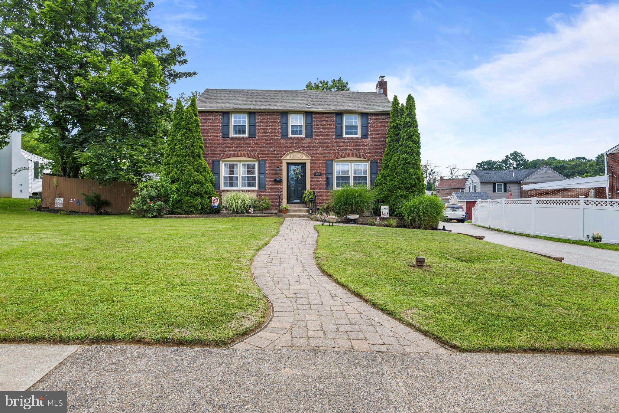 Welcome to 409 Colonial Park Dr, Absolutely One of Springfield Townships Finest & Could be One of Colonial Park's Most Unique Properties! You Must See This Expanded All Brick Colonial with an Incredible Three Story Addition. Situated on a Great Lot in the Middle of One of Delco's Most Desirable Communities - This 5 Bedrooms 2.2 Bath Home Will Blow You Away!! First Floor Features: Formal Living Room, Custom Tavern Bar, Open Concept Kitchen - Dining & Family Addition with Bonus Powder Room, Laundry Room & Mudroom w/ Access to Paver Patio & Back Yard, 2nd Floor Features: Three Generously Sized Bedrooms, Center Hall Bathroom & Master Suite w/ Walk-In-Closet & Incredible Master Bathroom. Lower Level Features: Family Room w/ Custom Bar & Egress Window, 5th Bedroom, Additional Flex Space, Powder Room & Separate Utility & Storage Areas. Upgrades & Extras Include: Addition on house 2011, Addition AC 2025,Water Heater 2024, Exhaust Fans Basement and Master Bathroom 2025. Don’t Let This One Slip By, Make Your Appointment Today!