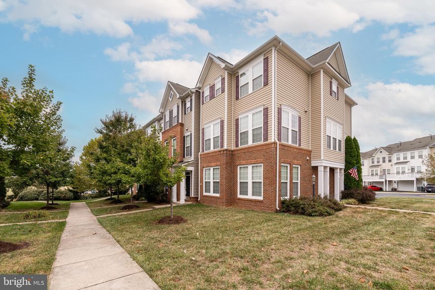 Welcome to this light-filled, move-in ready townhome set on a quiet street in a beautiful Ashburn neighborhood—moments to everyday essentials, parks, top-rated schools, and commuter routes (Dulles Greenway, Route 7) plus shopping and dining at Brambleton/One Loudoun and the Silver Line Ashburn Metro.

Entry Level: A private bedroom with full bath and closet space sits just off the foyer, perfect for guests, an office, or multi-gen living. The flexible recreation/living area offers room to lounge or work, with hardwood, tile, and fresh carpet underfoot. Interior access to the 2-car garage adds everyday convenience.

Main Level: An open concept great room framed by expansive windows and all-hardwood flooring is ideal for entertaining. The chef’s kitchen anchors the space with generous cabinetry and prep areas, flowing into a living room and dining area that open to the lovely, spacious patio—perfect for morning coffee or evening grilling. A powder room completes this level.

Upper Level: Find three generously sized bedrooms and two full baths, including an airy primary suite with excellent natural light. All bedrooms feature hardwood flooring and ample storage.

Highlights: 4 bedrooms including an entry-level suite • 3.5 baths • true 2-car garage • patio for outdoor living • open main level with hardwoods throughout • abundant natural light • close to groceries, cafes, fitness, trails, and major commuter options.