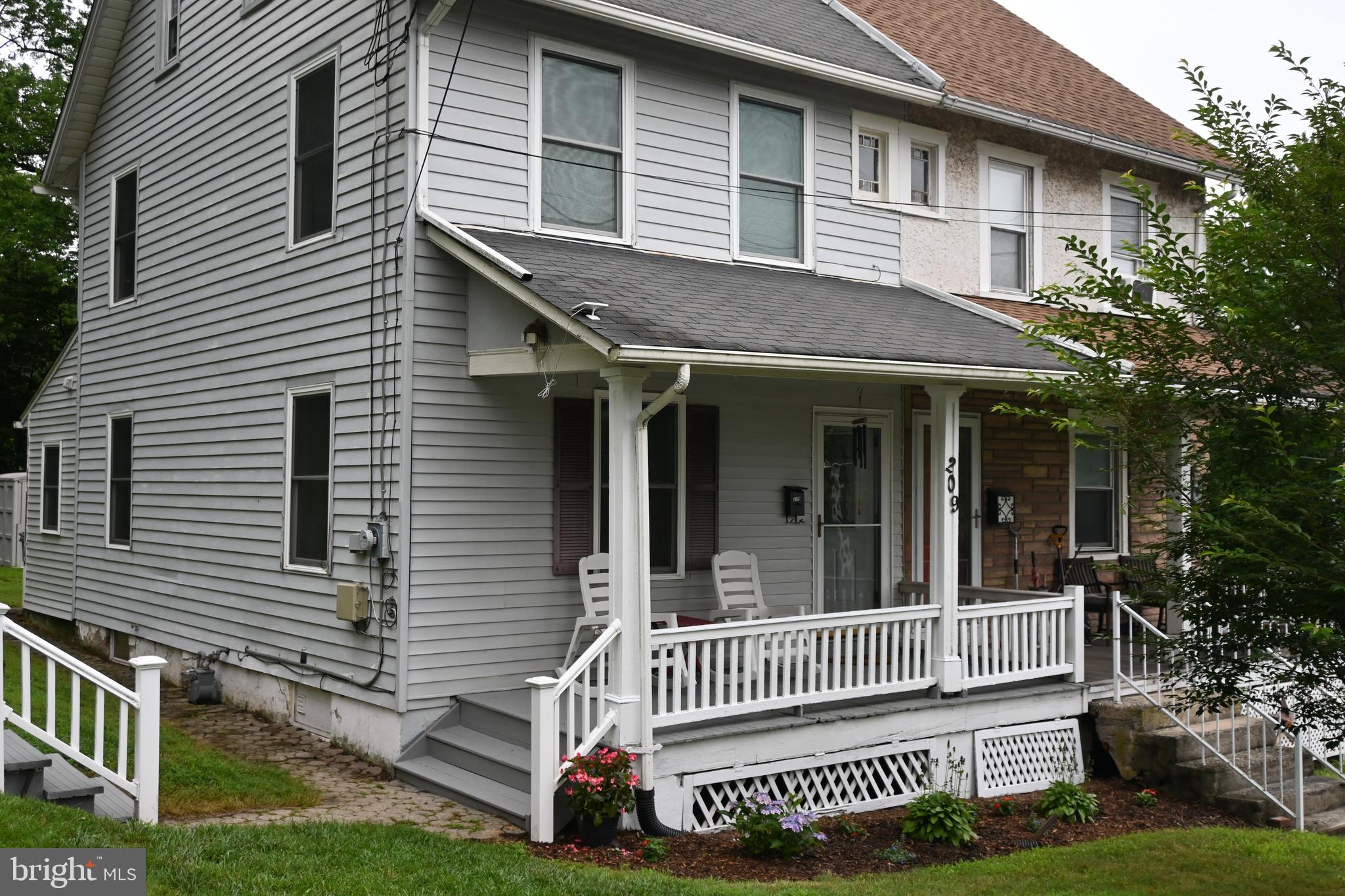 Location, Location, Location! Huge Perkasie Park is just down the street.
Walking trail, tennis courts, baseball fields, basketball court, playground and Menlo Aquatics /Pool in walking distance. You get the feeling the location of your home is on the edge of town being tucked into the hillside for privacy. Inviting 6 x 15 front porch for those relaxing evenings with park views. Handsome front door with glass panel. The first floor offers cherry wood flooring, with a ceiling fan in the living room. The updated kitchen includes 42” cherry cabinets, granite counter tops with a stainless under mounted sink. Gas cooking, built-in microwave, dishwasher and the refrigerator can stay. Recessed lighting, cherry flooring and window above sink. The powder room is located on the first floor to make life easier. 2nd floor offers a hall bath with a tub shower, tiled flooring, linen closet and cherry vanity. Two generous sized bedrooms on the second floor with closets and primary includes a small stained glass window. Third floor bedroom/office is large, too. Double hung newer windows, natural gas heating and hot water. Big backyard all treed. Shed will stay