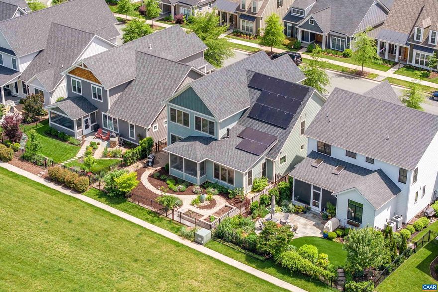 Built in 2019 as the builder?s model home, this beautifully crafted 5-bedroom residence in the heart of Old Trail features main-level living, high-end finishes, and a prime location that backs to green space with mtn views. Enjoy the ease of main-level living with a generously sized first-floor primary suite. Upstairs, you'll find an office loft with built-ins, 3 additional bedrooms, 2 luxe baths and a 19x27 bonus room with flex uses such as a 5th BR,  2nd floor family room/playroom, office or storage. The well-appointed kitchen features a Wolf cooktop, built-in side bar, an enviable walk-in pantry & large Pella windows to bring in the natural light.The fenced yard is a landscaped retreat, including raised planting beds with gate opening to common-area green space?perfect for play and recreation without the upkeep of a large lawn. Enjoy low energy costs with solar panels, a whole-house generator & high-efficiency HVAC. Conveniently located near walking trails, schools, shops, dining, a community pool, and a golf course. A fantastic opportunity to own a beautifully crafted home in a sought-after neighborhood known for its community atmosphere and Western Alb schools.,Wood Cabinets,Fireplace in Great Room