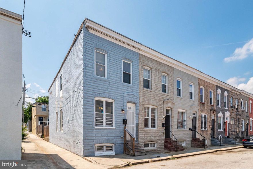 This end-unit rowhome is within walking distance of Patterson Park and ready for its new owner! The convenient location provides easy access to Johns Hopkins Hospital, public transportation, major travel routes and many local amenities. The main level has an inviting open floor plan with a living room, wonderful natural light, a separate dining space and an updated kitchen. Upstairs, there are two spacious bedrooms, a full hall bath and laundry. The unfinished lower level has the mechanicals and plentiful storage space. The large rear patio has a privacy fence and is perfect for relaxing outdoors. With the corner alley access, the patio has potential to be converted to private parking. This home qualifies for a mortgage insurance-free Healthy Neighborhoods Purchase/Renovation Loan and a possible $10,000 grant to match a renovation project. It may also be eligible for various Baltimore City incentives such as Live Near Your Work. Schedule a tour today!