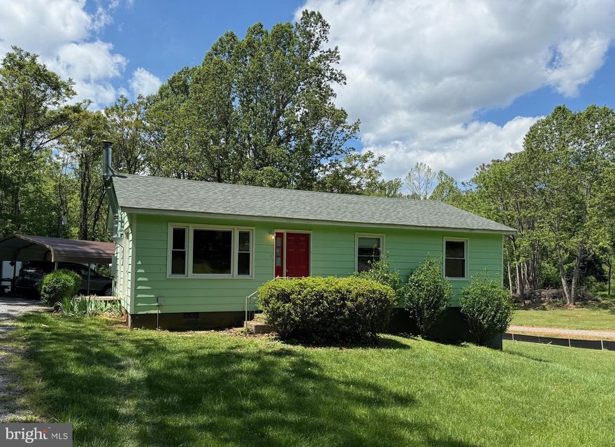 Somerset is located in the foothills of the Blue Ridge Mountains and this lovely rancher nestled on a .92 acre lot with wooded views is less than 1 mile from The Market at Grelen, a European Garden Shop set on Grelen Nursery's 1000-acre tree farm.  This 3 bedroom, 1.5 bath, 1008 sf home boasts a new architecural shingled roof, new Lennox Elite Heat Pump, two Stiebel Eltron tankless on demand water heaters, new stainless electric range and built-in microwave.  Mature oak and tulip trees provide abundant shade to your yard.  New construction home to the right is 1200 sf and is selling for $350,000.

Extras include:  Detached garage, carport, 10' x 12' deck, 2 large sheds, stackable washer & dryer, dual pane vinyl windows, partial house gasoline generator, wood burning stove in the family room, under cabinet lights, fresh paint and new carpet.  Work bench and water softener system in walk-in crawl space convey.

Seller would be interested in selling the riding lawnmower and trailer.