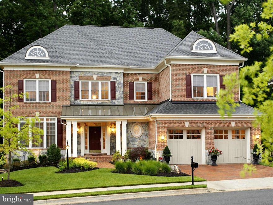 The "Northbourne" is the most spacious & dramatic home in Pickett's. 4 sides brick & stone, brick driveway, prime location backing to 15 acre wooded park.10 - 12" ceilings, 5 BRs, 4 1/2 baths, W/O lower level. Custom paint, moldings, blinds & window treatments.Chef's kitchen, Covered porch, 1200 sqft deck, 1000 sqft flagstone patio w/stone wall, sprinklers & magical outdoor lighting.