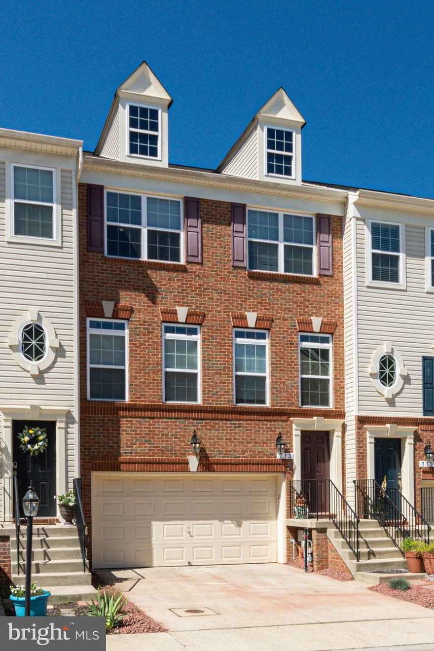 Looking for a townhouse that's a cut above the rest? Well, come on by and check me out today!  I have features a-plenty, considering I was built as a model home with the “Stanford” floor plan. My generous 2800+ square feet includes three bedrooms, two full baths, two half baths, and hardwood floors. The kitchen is the heart of the home, and my beautiful chef's kitchen is up to the task with stainless steel appliances, granite countertops and island, and crown molding on the cabinets for that extra special touch.  Make yourself at home in my owner's suite featuring separate over-sized shower and soaking tub, walk-in closet, and private balcony overlooking the wooded area behind the home. Can you picture yourself with your big, fluffy robe and morning coffee sitting out on the deck watching the day come alive?  The walk-out basement gives you easy access to the outdoors and offers plenty of lighting (a.k.a. Not a dungeon!). With so many people working from home now, this could be the ideal space set up for your home office, studies, etc.   Parking is a breeze with my attached two-car garage. Protect your vehicle from the elements (less scraping in winter!) and stay dry getting in or out during inclement weather.   I have a fresh coat of paint and I am waiting for you to make me yours. My neutral interior will work well with any choice of style, or shake it up a bit to personalize my colors for your taste. That's what feeling at home is all about!  The neighborhood and location are great, with quick access to major highways and convenient to the international airports. Glen Burnie and Anne Arundel County offer plenty of shopping and dining to suit all your needs. Browse the stores at Arundel Mills Mall or Marley Station, or visit The Gallery located in Baltimore's Inner Harbor just a short drive away.  When you're ready to explore local restaurants, try some killer margaritas and chimichangas from Super Tacos Oaxaca, grab breakfast at Willy's Kitchen, relax in the evening at Founders Tavern & Grill, or order up some tasty sushi, wings, or shrimp salad at Broken Oar Bar & Grill.  It is time to come visit NOW and see me for yourself. I just know we're going to be great for each other.