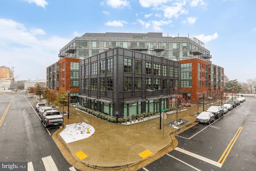 Step Inside The Muse — Old Town Alexandria’s newest and most exclusive address, where art, architecture, and the Potomac River converge in perfect harmony. Crafted by Carr Companies, this boutique residence redefines Artful Living.

Residence 206 is a breathtaking two-bedroom, two-bath retreat that embodies modern luxury and effortless sophistication. Framed by floor-to-ceiling glass that bathes every space in natural light, this open-concept sanctuary offers a seamless flow designed for both relaxation and entertaining.

The chef’s kitchen is a showpiece—featuring custom Italian cabinetry by Snaidero, an oversized quartz waterfall island, Thermador panelized appliances, a wine cooler, and generous storage that balances form and function beautifully. Nine-foot ceilings and 7.5-inch European oak flooring create a timeless, organic aesthetic that enhances the home’s airy ambiance.

Step out onto the expansive private balcony and take in tranquil views of the Potomac River, or retreat to your serene primary suite framed in glass. The spa-inspired bath is a study in luxury, with Calacatta quartz surfaces, Brizo and Waterworks fixtures, and a layout designed to evoke calm and comfort.

Every detail at The Muse is curated for a five-star lifestyle. Residents enjoy 24/7 concierge and porter service, a dedicated on-site engineer, an art-inspired owners’ lounge, a rooftop terrace with panoramic views of the Potomac, Capitol, and monuments, a Zen outdoor movement space, and a state-of-the-art fitness and yoga studio. Secure garage parking completes this unparalleled living experience.

Ideally located along Old Town’s vibrant waterfront, The Muse offers immediate access to the Mount Vernon Trail, Tide Lock Park, and Alexandria’s best dining, coffee, and retail—including Oak Steakhouse, Café 44, St. Elmo’s Coffee Pub, Goldfinch, Trader Joe’s, and Harris Teeter—all within a few blocks. Just nine blocks to King Street, five miles to Downtown DC, and only one stoplight to Reagan National Airport, this is luxury, location, and lifestyle in perfect balance.
Unit 206 at The Muse — where every detail inspires, and every moment feels like a masterpiece.