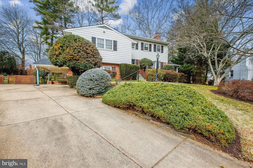 Fabulous, large, updated & remodeled & greatly expanded 4200sf  5-level split with a 1/3 acre lot featuring 6 bedrooms (3 with en-suite baths) & 4 full baths.  Wonderfully remodeled kitchen with granite, 42" cabinets, stainless appliances (all replaced in the last 4 years), separate pantry and breakfast nook w/bay window overlooking the fenced and professionally landscaped backyard.  It's a retreat back to nature!   Wonderful addition includes oversized primary suite w/lots of windows bringing in light, w/amazing dual walk-in closets w/custom built-ins and laundry chute. And, the primary suite bath w/its glass-doored walk-in rain shower, dual vanity & separate private toilet is a luxury.  2nd Lower Level w/it's dual workbenches, cabinetry & multiple closets is great for storage, a workshop, or craft room. There are too many updates to mention! This home boasts 2 fireplaces (one wood, one gas), rec room w/built-ins, hardwood floors, screened porch, carport & expanded driveway.  Overlooking the fenced back yard, the deck AND patio in the back make for some great entertaining! Conveniently located in the McLean High pyramid, just minutes to metro, pools, schools, amenities & major commuting routes.