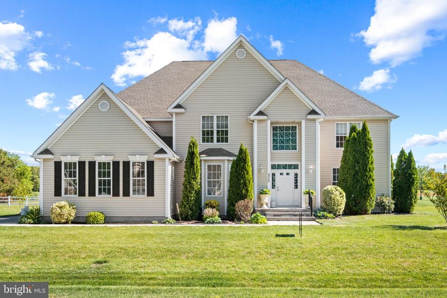Welcome to this spacious and well-appointed two-story single-family home nestled on a generous 0.47-acre corner lot in the Pintail Pointe community in Milton, Delaware. Built in 2007 and offering 4,408 sq ft of living space, this 5-bedroom, 4-bathroom residence (3 full, 1 half) delivers an exceptional combination of size, comfort, and functionality, all at just $187/sqft.

Main Level: The first floor is thoughtfully laid out for both everyday living and entertaining. A welcoming foyer opens into a spacious living room featuring soaring high ceilings and a cozy propane fireplace. The main level also includes a dedicated home office, a den, and a kitchen with an island and separate dining area. A full bedroom and two bathrooms on the main floor offer excellent accessibility and flexibility. Laundry is conveniently located on this level as well.

Upper Level: Upstairs you’ll find the remaining bedrooms, additional bathrooms, and a bonus room perfect as a playroom, media room, or flex space.

Exterior & Lot: Sitting on nearly half an acre on a corner lot, the home features a side-facing 2-car attached garage with driveway parking for up to 6 vehicles total, plus an underground lawn sprinkler system and a deck for outdoor enjoyment.

Community & Location: Pintail Pointe is a quiet residential community with a modest $272/quarter HOA. The home is in the Cape Henlopen School District, feeding into the highly-rated Cape Henlopen High School (8/10 GreatSchools rating). Delaware’s beach towns, Lewes, Rehoboth, and Dewey Beach, are just a short drive away, making this a fantastic primary residence or beach-area retreat.