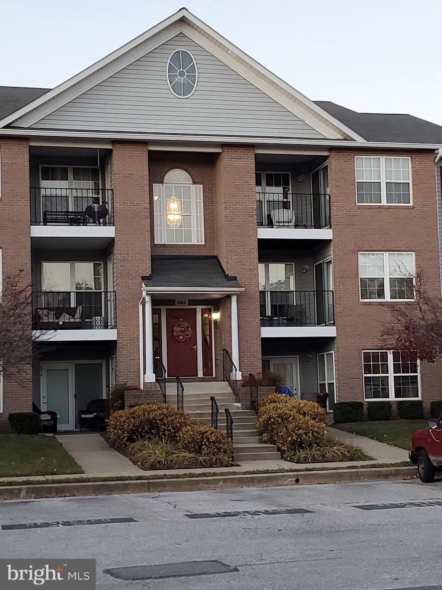 Come see this lovely condo on Sunnyfield Ct in Hampstead, MD. This 2nd floor unit has 2 bedrooms and 1 full bath.  Your front door opens up to an L-shaped living room. The carpeting  looks like it is brand new. Enjoy 4 window views of a beautiful tree lined back drop with a row of evergreen trees behind them. Beyond those trees open up to farmland. Your dining area has vinyl  flooring that looks like wood and a  sliding door that  opens up to your deck. Enjoy your deck  with terrific views of nature. The Master Bedroom has 2 walk-in closets. One of those closets has a rough -in for adding a 2nd bathroom. Your kitchen comes complete with a refrigerator, oven/stove combo, a built in microwave, and dishwasher. Your utility room has a washer and dryer.  You have one reserved parking spot in front of your building and additional parking for another car or for guests.