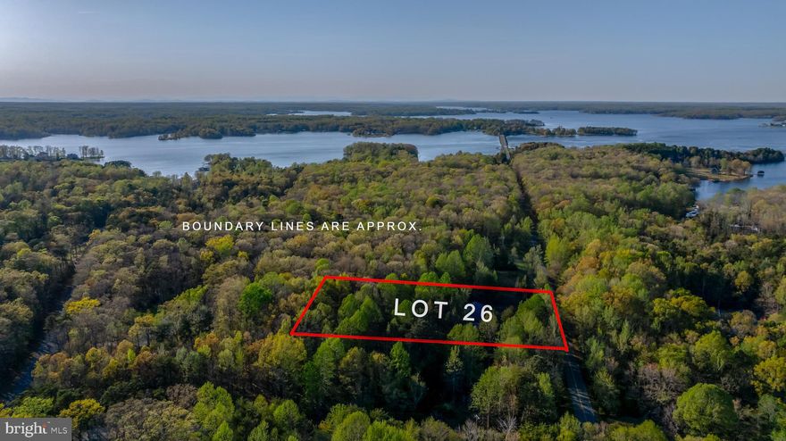 WATER ACCESS on LAKE ANNA'S PRIVATE SIDE!  Enjoy this convenient location for easy access to both the Private Side (via Moorefields Landing) AND ALSO the Public Side - as Moorefields Landing is just across the street from Dike 3's Public Fishing "hot spot", and also just around the corner from Pleasants Landing!  The lot itself is a beautifully wooded (but not densely wooded) 1.2-acre level lot, ideal for a predictable build!  Soil work from 2005 perc'ed for a 3-Bedroom conventional system - buyer should confirm and update.  At the common area, you'll enjoy beautiful water views, a boat ramp, a pier, a swing set, and picnic area - but the best part is there are no dues and no active POA - ask your agent to ask for details!  The nearby Pleasants Landing Marina (and affiliated businesses) offers you the closest Public Side access, as well as a sandy beach and waterfront Mexican restaurant, boat sales, boat repair, concerts and events for the whole family!