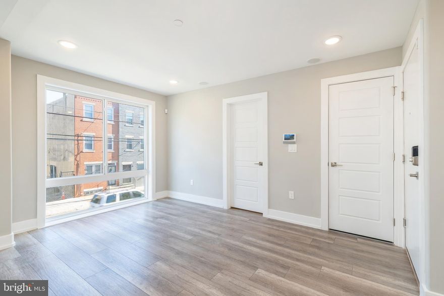 Welcome to 2238 N 2nd St (Unit #2) in the Norris Square area. This new construction unit features 1 bed 1.5 bath unit with shared roof deck with beautiful views.  Unit includes in-unit washer/dryer, open concept living/kitchen, stainless steel appliances and quartz countertops. It comes with all the extras as well, from surround sound built in speaker system, to smart thermostat and security system.  You are short walk to the York Dauphin St el station stop.  New construction is everywhere.  Public transportation and the York Dauphin EL station is a short walk away.  Norris Square Park is less then a five minute walk and all the restaurants and coffee shops in the area are in close proximity as well.