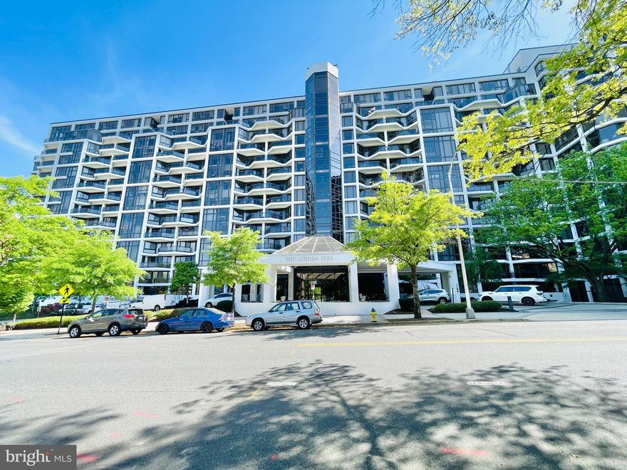 The Atrium is a beautiful high-rise building in the Rosslyn.  This condo has views from the large balcony living room and the wall to ceiling windows in the bedroom. The Atrium has a number of resort-style amenities for residents’ use, including a swimming pool, tennis courts, a fitness center and a party room. Residents of The Atrium benefit from the nearby nature trails along the bank of the Potomac River and the Rosslyn metro station is less than three blocks away.  This apartment is a spacious 1 bedroom, 1 bathroom home with hardwood floors throughout.  Located on the 4th floor.  Washer and dryer in the unit.  Updated bathroom and elegant entryway.