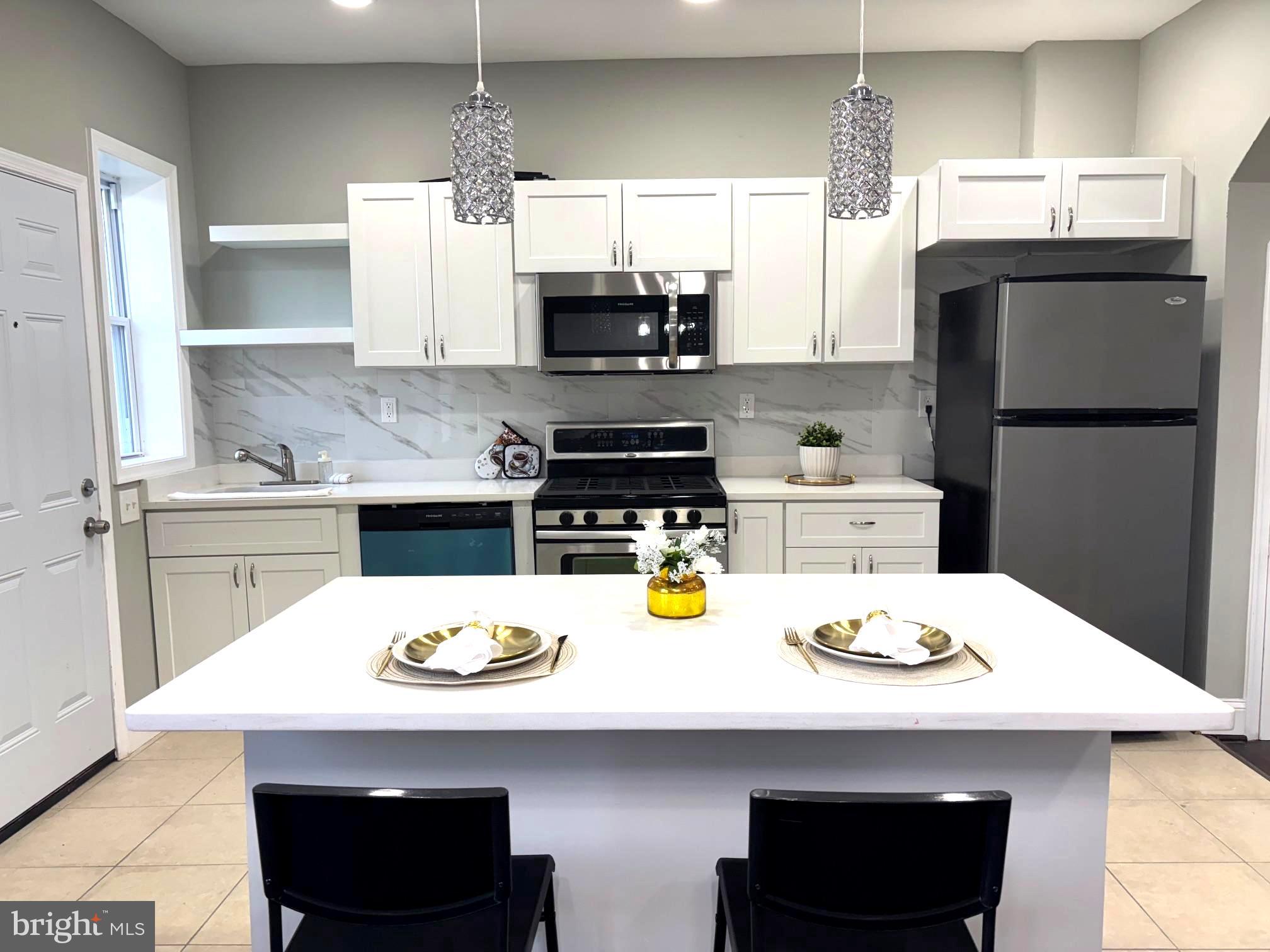 Calling Home owner and First time Home buyers. Why renting when you can own!
Step into this stunningly renovated property in the heart of Baltimore! Every detail of this home has been carefully designed to offer modern living at its finest. Located just minutes away from premier shopping, top-rated hospitals, and all the conveniences you desire, this home combines luxury and practicality.
🌟 Features You’ll Love:
Gourmet Kitchen: A chef's paradise featuring state-of-the-art appliances, sleek countertops, and ample cabinet space – perfect for creating culinary masterpieces.
Fenced Backyard: Enjoy your privacy in the beautifully fenced backyard, ideal for gatherings, relaxation, or gardening.
Private Office Space: Whether you’re working from home or need a quiet retreat, the dedicated office space provides the peace and functionality you need.
Main Bedroom Suite: Unwind in the main bedroom, complete with a master bathroom for ultimate comfort.
Full basement offers plenty of storage options to keep your home organized and clutter-free.
This home is a rare gem that blends charm and modern amenities, making it perfect for families, professionals, or anyone seeking a stylish and comfortable living space. Property is not offered for investors.