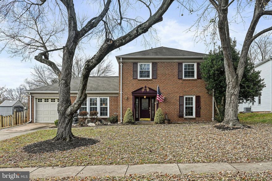Offer deadline Sunday, Dec 3 at 5 pm. 
 Nestled on a sprawling .38 acre lot, this brick-front colonial residence is a perfect blend of classic charm and modern convenience. Boasting a one-car garage and a concrete driveway for two cars, this home is both practical and stylish. Step inside and explore the delightful features that make this property truly special.
The entry foyer welcomes you with tile floors and beadboard accents, setting the tone for the home's character.  The living room features luxury vinyl plank (LVP) flooring and convenient access to the garage, creating a functional and inviting space.  The kitchen is a chef's delight, complete with a center island adorned with pendant lighting, tile floors, granite counters, and stainless steel appliances.  A dedicated laundry area off the kitchen adds to the home's practicality.  The dining room exudes elegance with chair rail and wainscotting, providing a perfect setting for formal gatherings.  The family room, with a wood-burning fireplace (currently non-functioning), sets a cozy ambiance and opens to a patio through a sliding glass door.  A main level den/bedroom with a powder room adds versatility to the living spaces.
Ascend the stairs to discover four additional bedrooms, each adorned with hardwood flooring for timeless appeal.  The primary suite boasts hardwood floors and a private bath with a shower, creating a tranquil escape.  The hall bath features a tub/shower combo, providing convenience for the other bedrooms.
Ceiling fans throughout the upper level enhance comfort in every room.
The three-season room, a favorite among residents, features cathedral ceilings and direct access to the large rear yard, offering a perfect blend of indoor and outdoor living.
The large fenced yard is a true outdoor paradise, complete with a pond, numerous outbuildings, greenhouse framing, and garden plots.  A Leaf Filter system warranty conveys, ensuring hassle-free maintenance.
Great location close to major commuter routes, shopping, schools and restaurants.